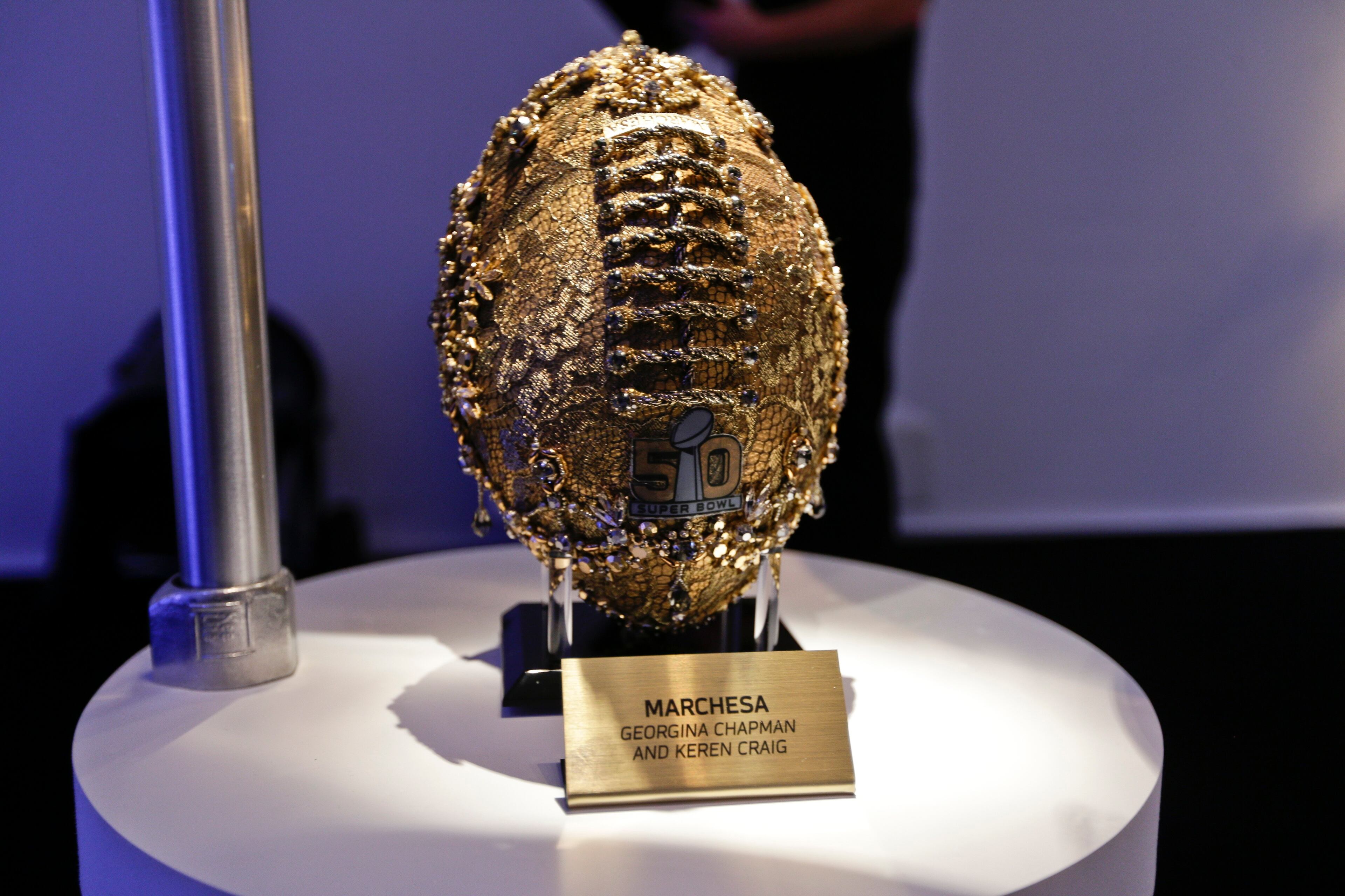 A Marchesa football is shown at the unveiling of the CFDA tootballs Wednesday, Jan. 20, 2016, at NFL headquarters in New York. To mark the upcoming 50th Super Bowl, the NFL and the Council of Fashion Designers of America have collaborated on 50 designer footballs created by CFDA members. (AP Photo/Frank Franklin II)