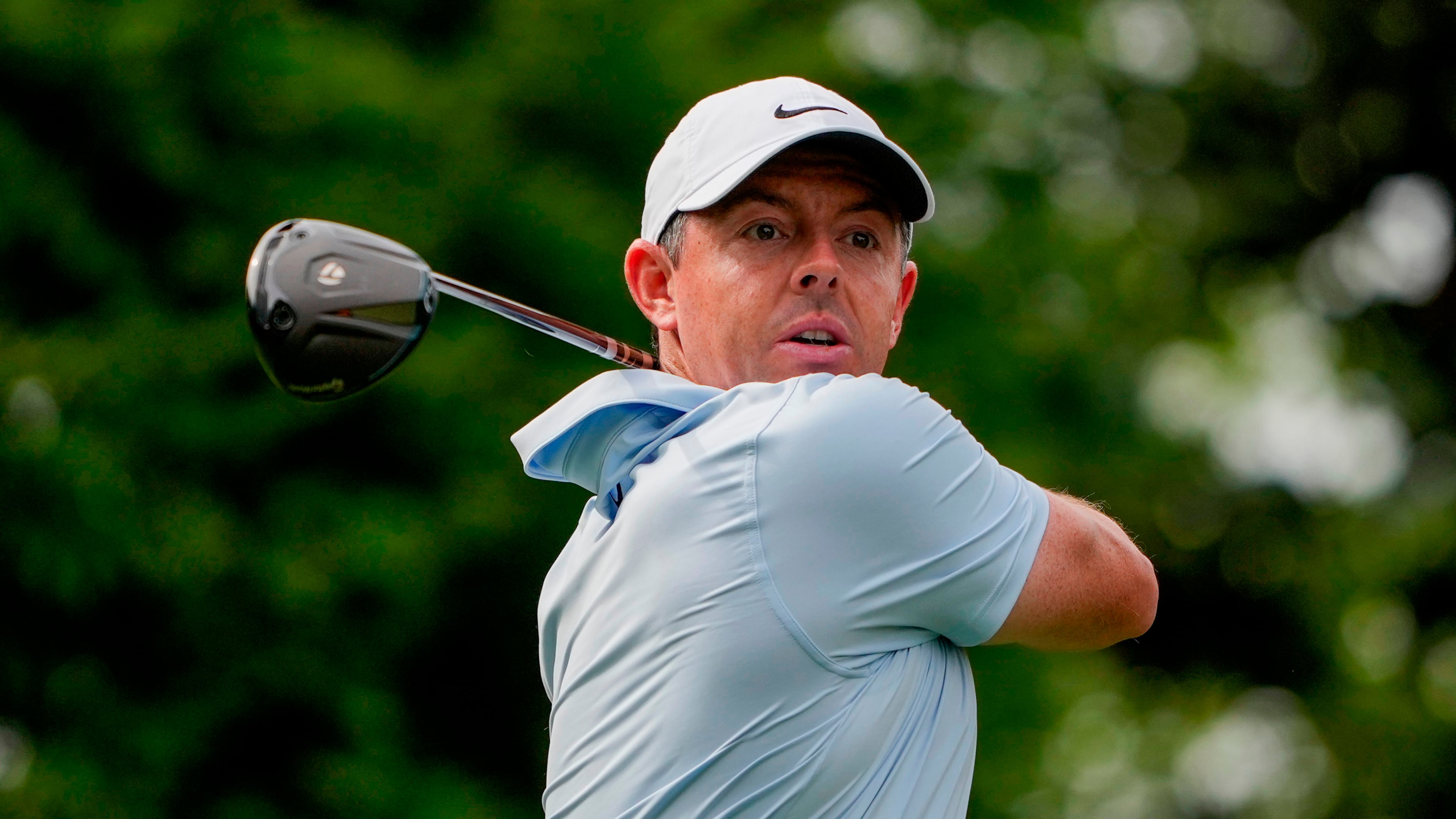 Rory McIlroy, of Northern Ireland, hits from the 16th tee during second round of the Truist Championship golf tournament at the Quail Hollow Club, Friday, May 8, 2026, in Charlotte, N.C. (AP Photo/Chris Carlson)