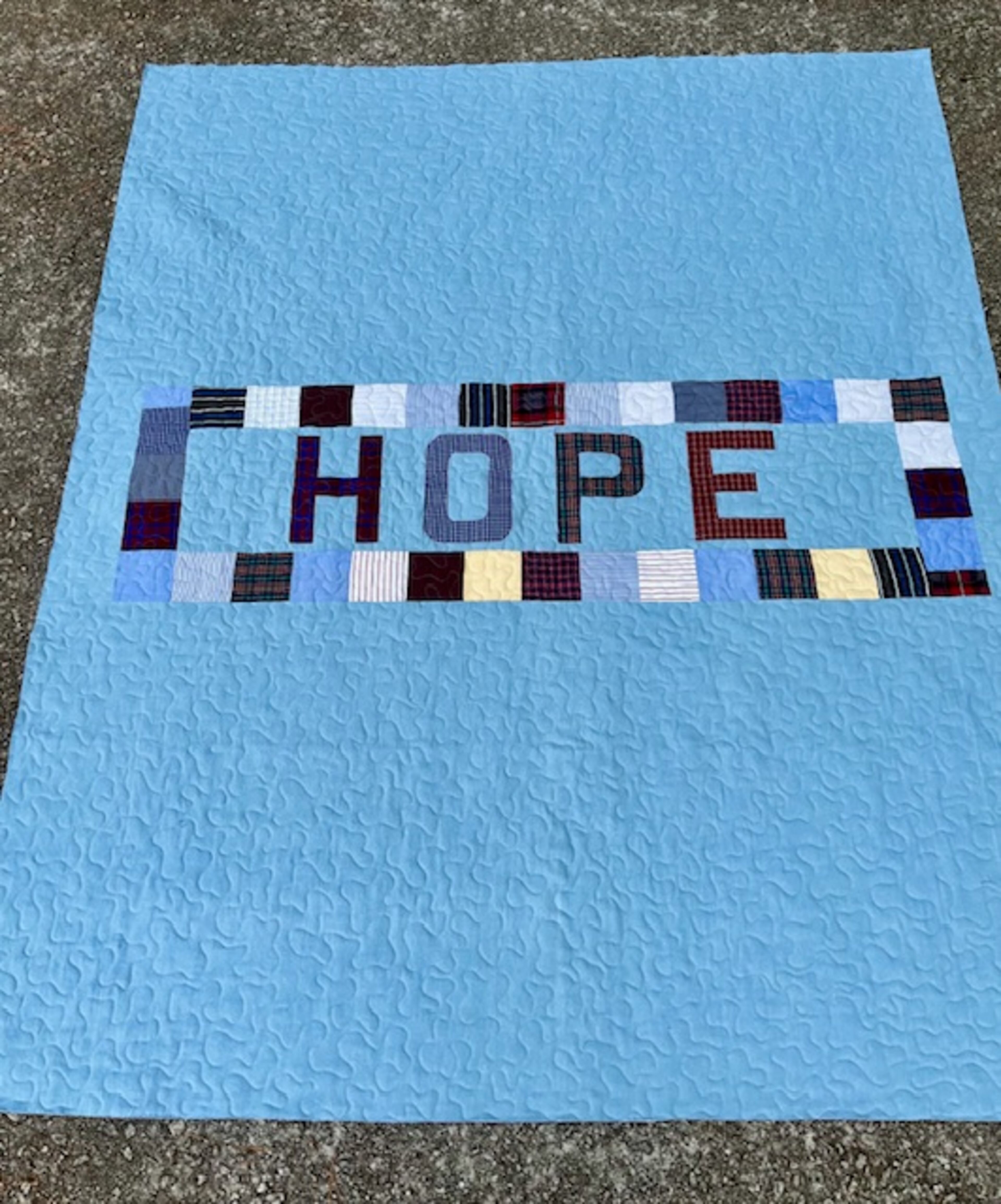 The six women in the quilting class at the Women's Transitional Center worked together to produce this communal project, representing hope.
(Courtesy HeartBound Ministries)
