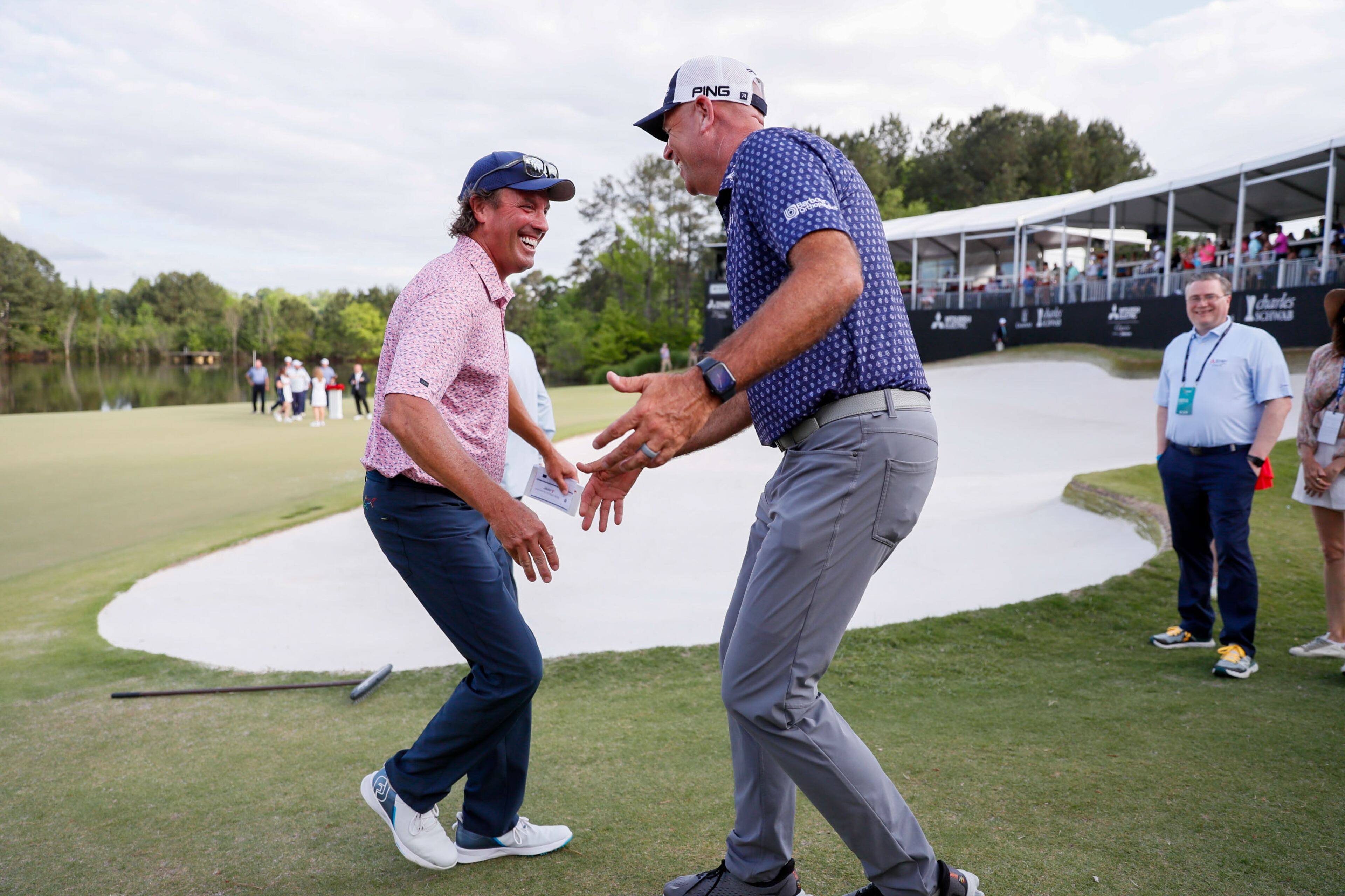 Stephen Ames celebrates with Stewart Cink after winning the Mitsubishi Classic senior golf tournament at TPC Sugarloaf, Sunday, April 28, 2024, in Duluth, Ga.
(Miguel Martinez / AJC)