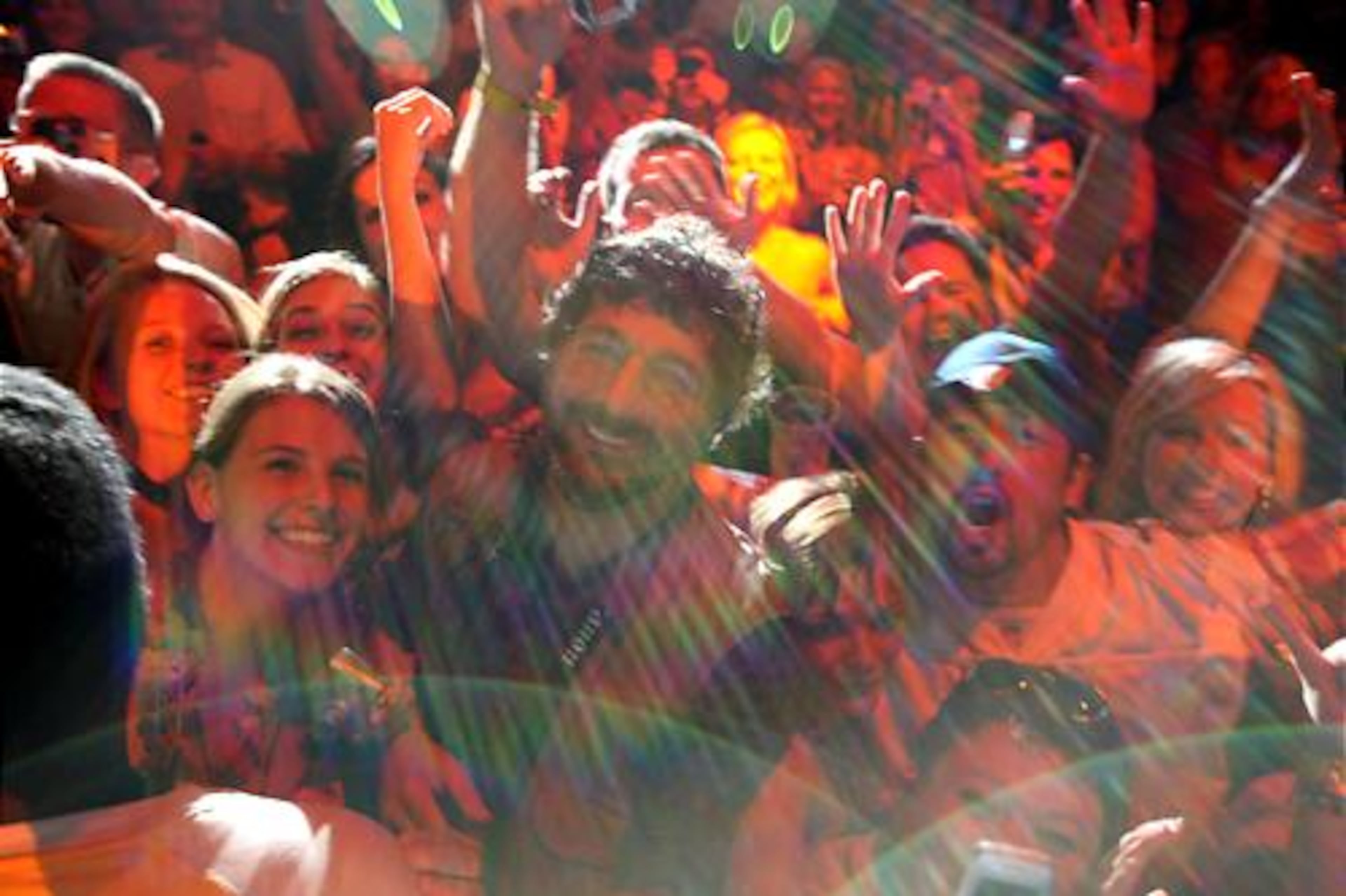Kenny Chesney snapped this photo during the opening song of his set. He motioned to this photographer (center) to hand him my camera, and the singer proceeded to take crowd photos, then high-fived me as he handed back the camera.