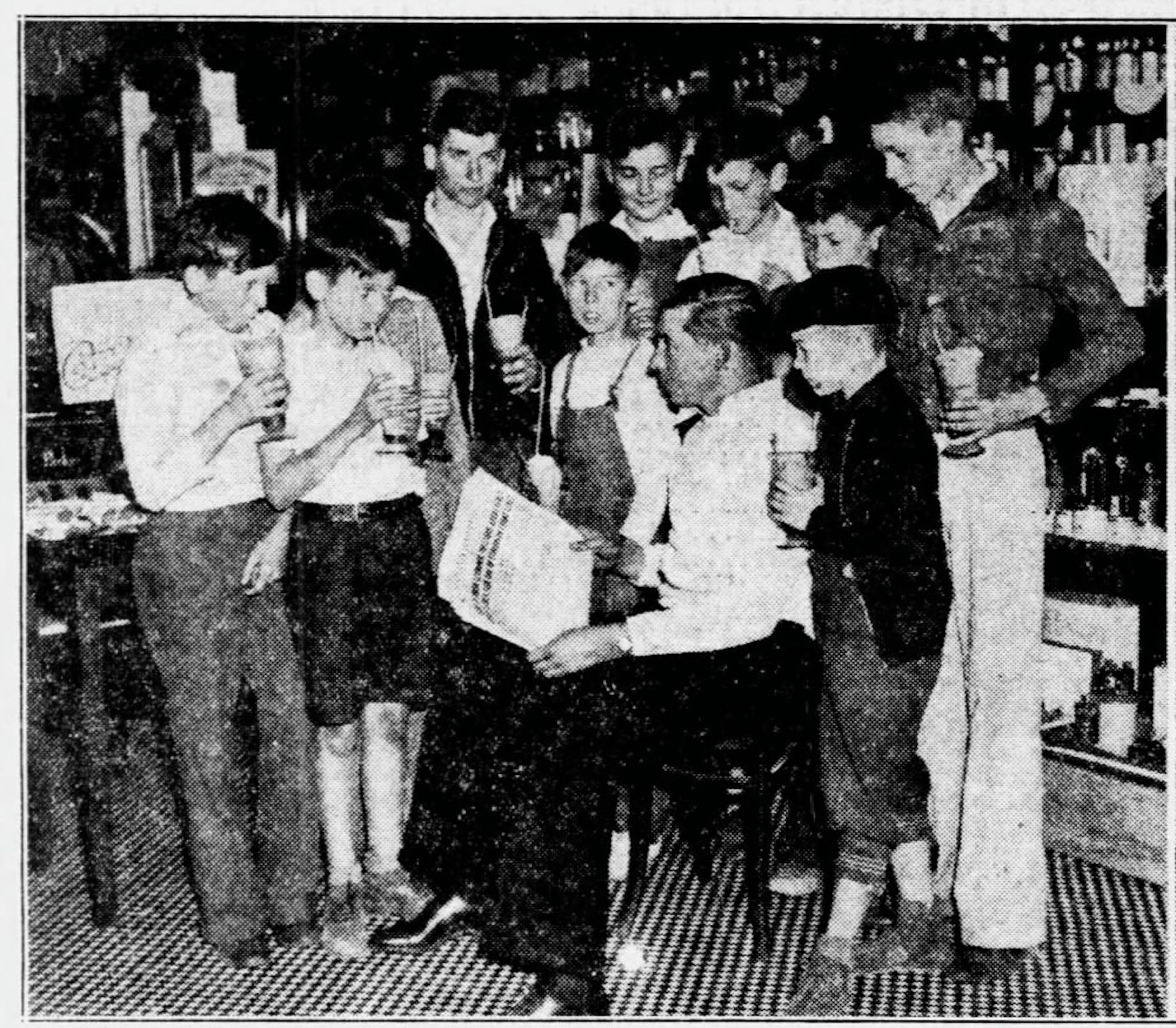A photo of kids gathered at Wender & Roberts in a 1935 edition of The Atlanta Constitution. (AJC archives)