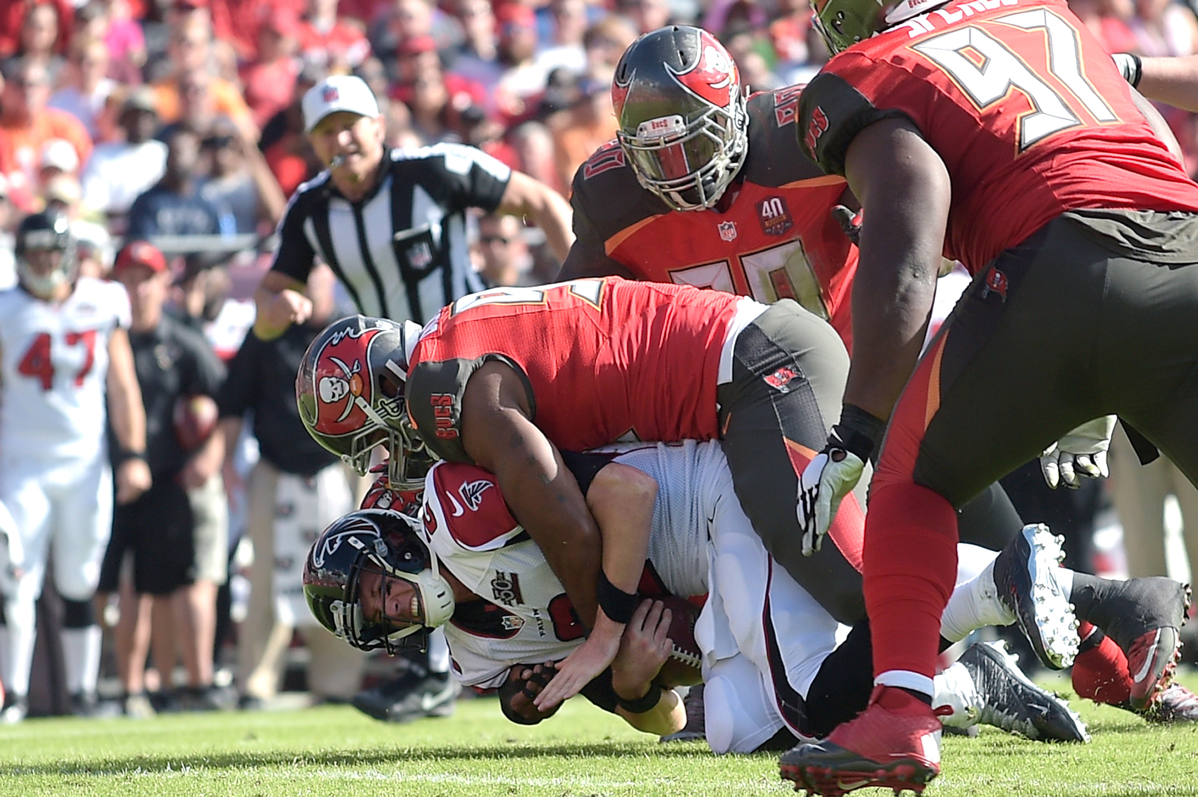 Atlanta Falcons quarterback Matt Ryan (2) is sacked by Tampa Bay Buccaneers defensive end William Gholston during the first half of an NFL football game in Tampa, Fla., Sunday, Dec. 6, 2015. (AP Photo/Phelan M. Ebenhack)