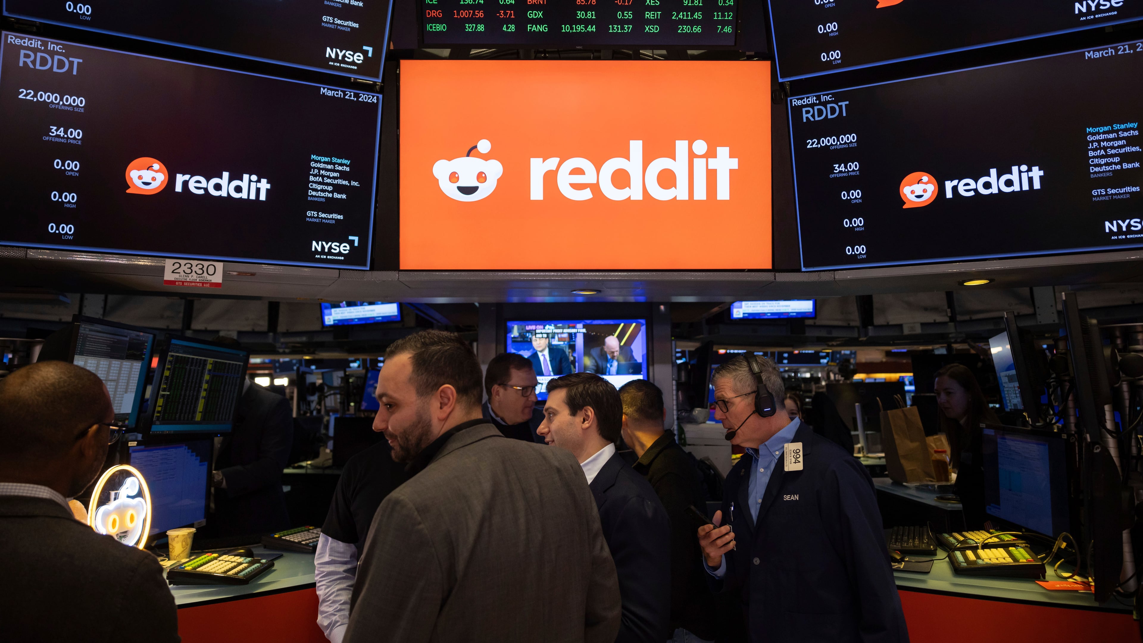 FILE - Reddit Inc. logos are displayed on the New York Stock Exchange trading floor, prior to the company's IPO, Thursday, March. 21, 2024. (AP Photo/Yuki Iwamura, File)