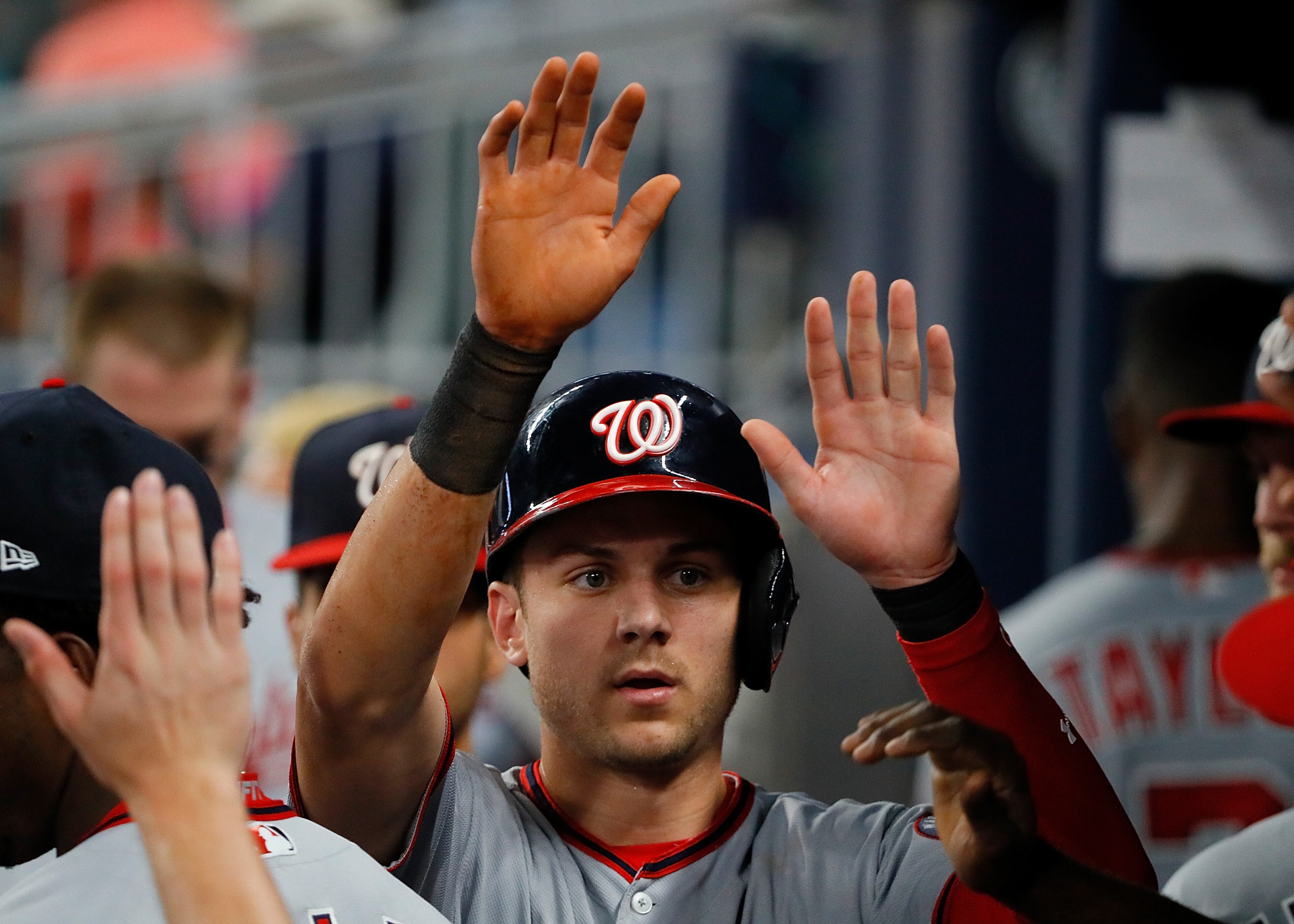 ATLANTA, GA - SEPTEMBER 19: Trea Turner #7 of the Washington Nationals reacts after scoring on a RBI single by Ryan Zimmerman #11 in the third inning against the Atlanta Braves at SunTrust Park on September 19, 2017 in Atlanta, Georgia. (Photo by Kevin C. Cox/Getty Images)