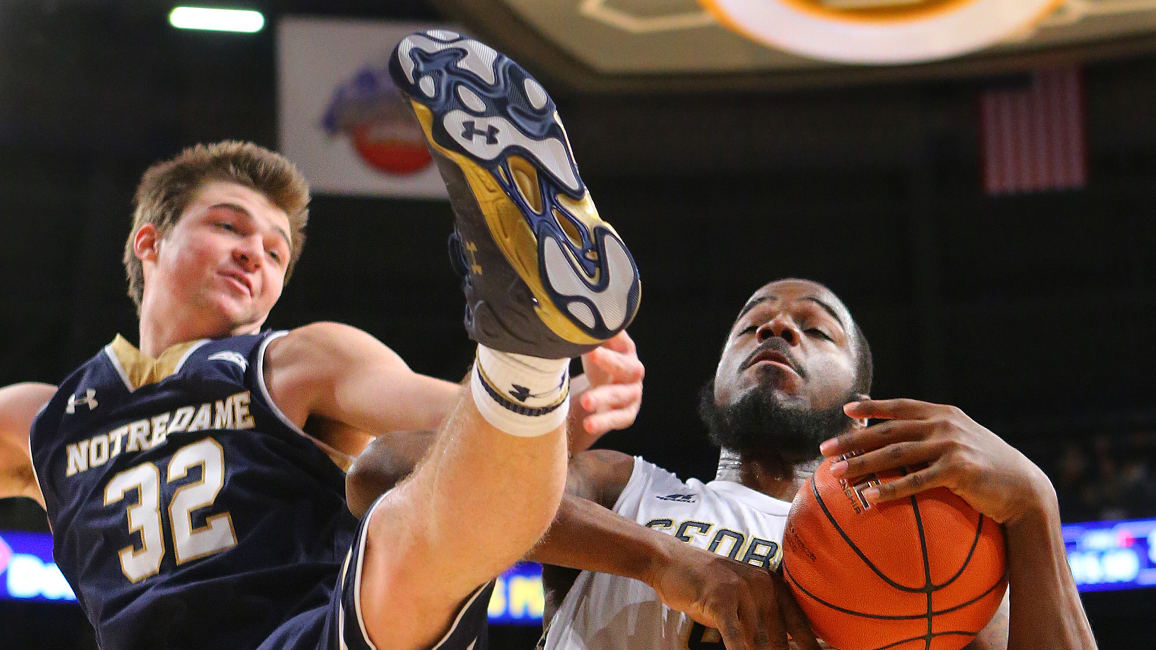 Georgia Tech's Demarco Cox battles Notre Dame's Steve Vasturia (32) for a rebound during the second half at McCamish Pavilion in Atlanta on Wednesday, Jan. 14, 2015. Notre Dame won, 62-59. (Curtis Compton/Atlanta Journal-Constitution/TNS) Georgia Tech center Demarco Cox's career-high 17 points were not enough to lift the Yellow Jackets to their first ACC win of the season. (ASSOCIATED PRESS)