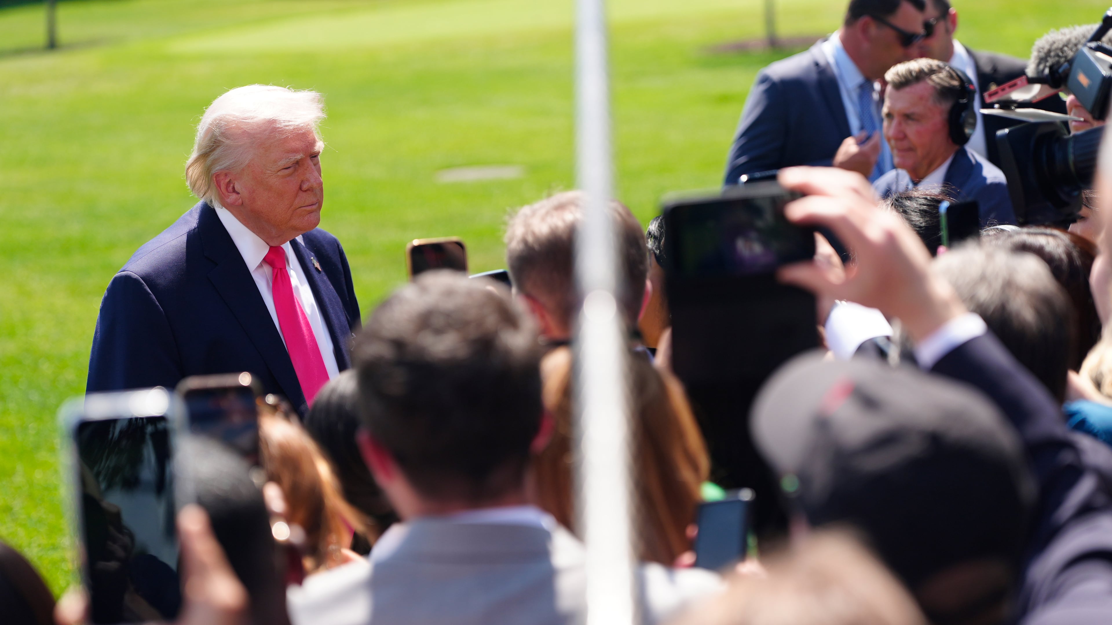 President Donald Trump speaks with reporters before departing on Marine One from the South Lawn of the White House, Thursday, April 16, 2026, in Washington. (AP Photo/Jen Golbeck)