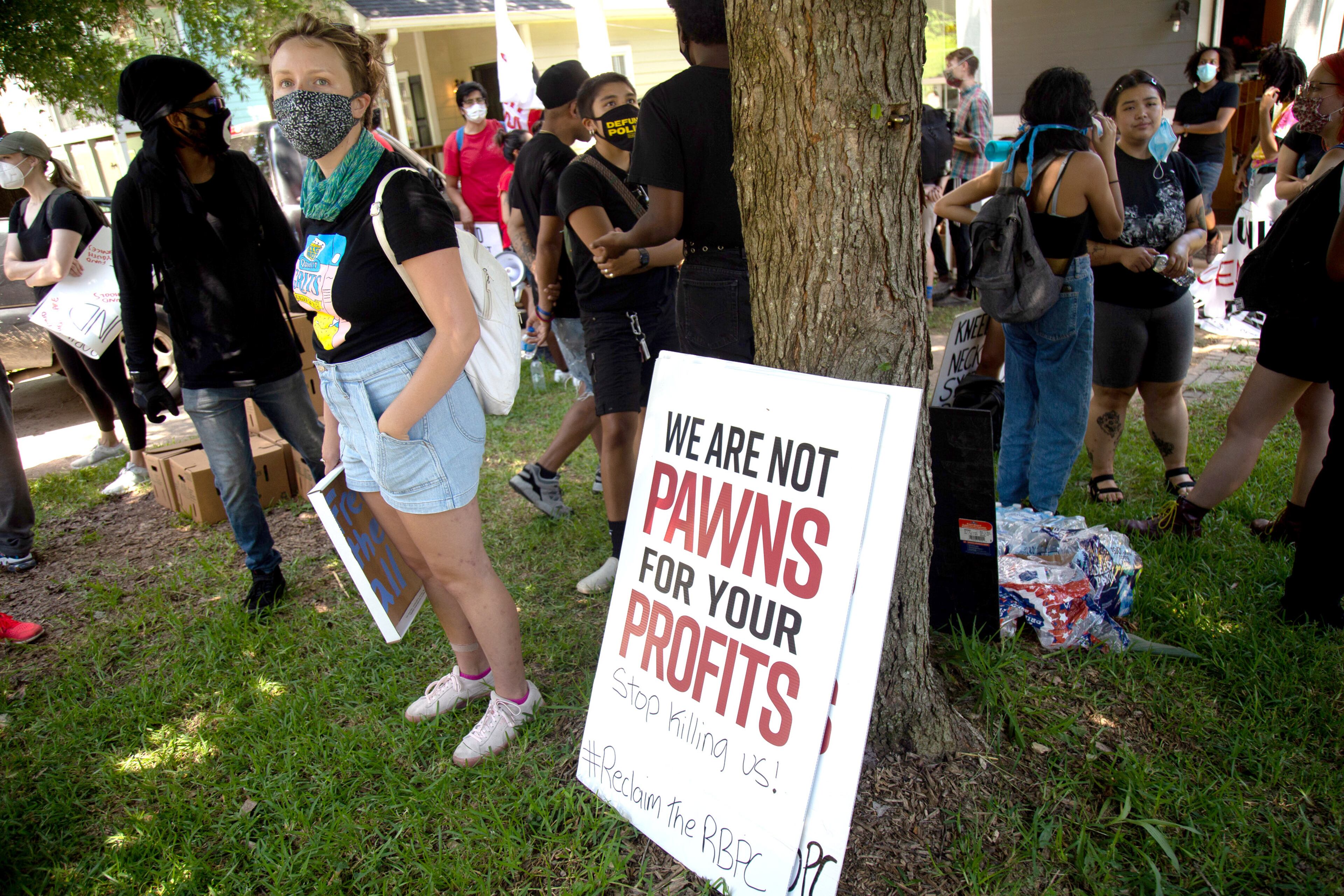 Protesters get ready before heading to the Wendy's on University Avenue during the 'Take Back the Wendy's' March & Rally in Atlanta on Saturday, July 11, 2020. The march started at the Community Movement Builders community house and ended at the Wendy's. STEVE SCHAEFER FOR THE ATLANTA JOURNAL-CONSTITUTION