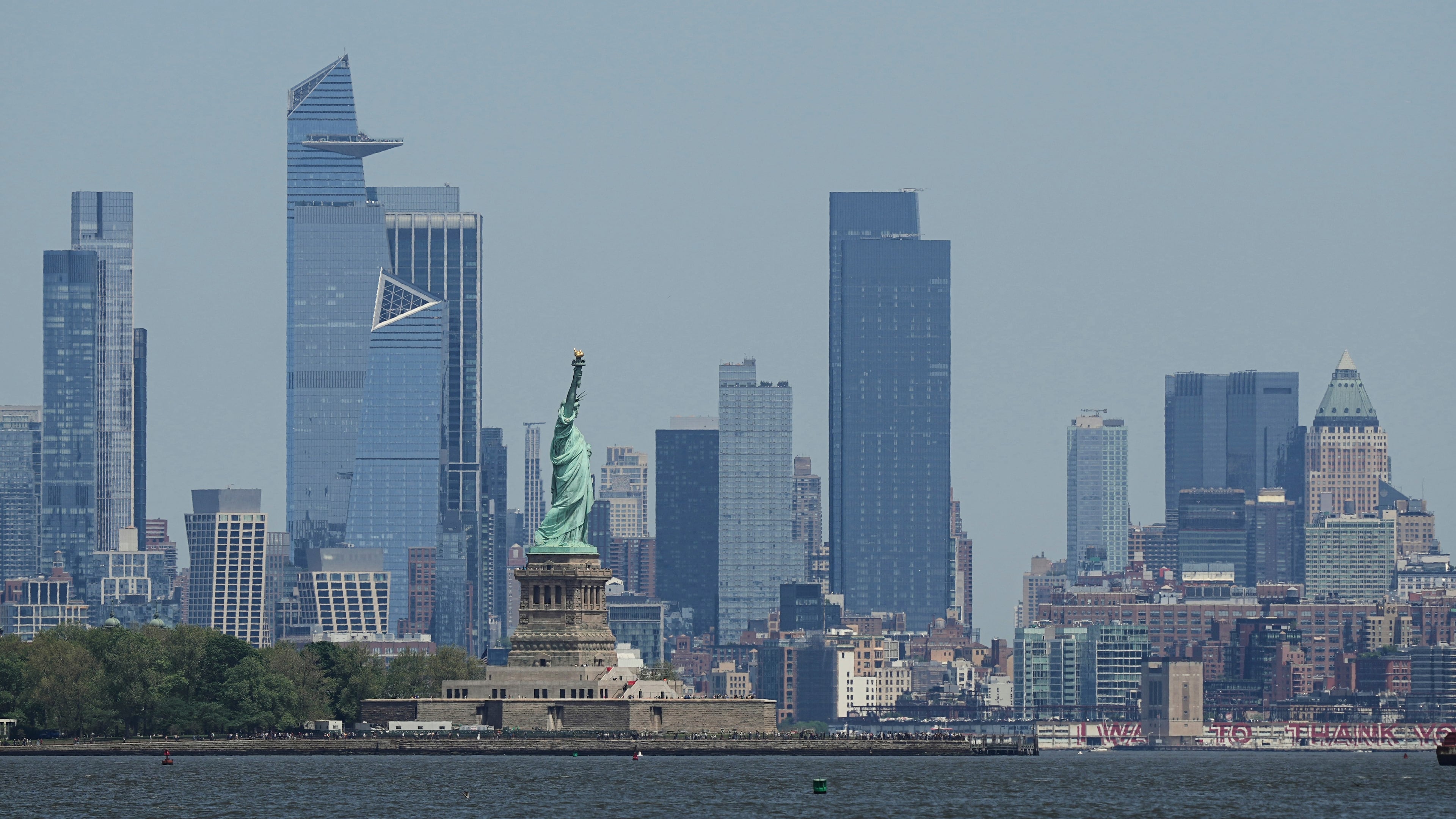 FILE - The New York skyline and Statue of Liberty are seen on May 12, 2025. (AP Photo/Matt Rourke, File)