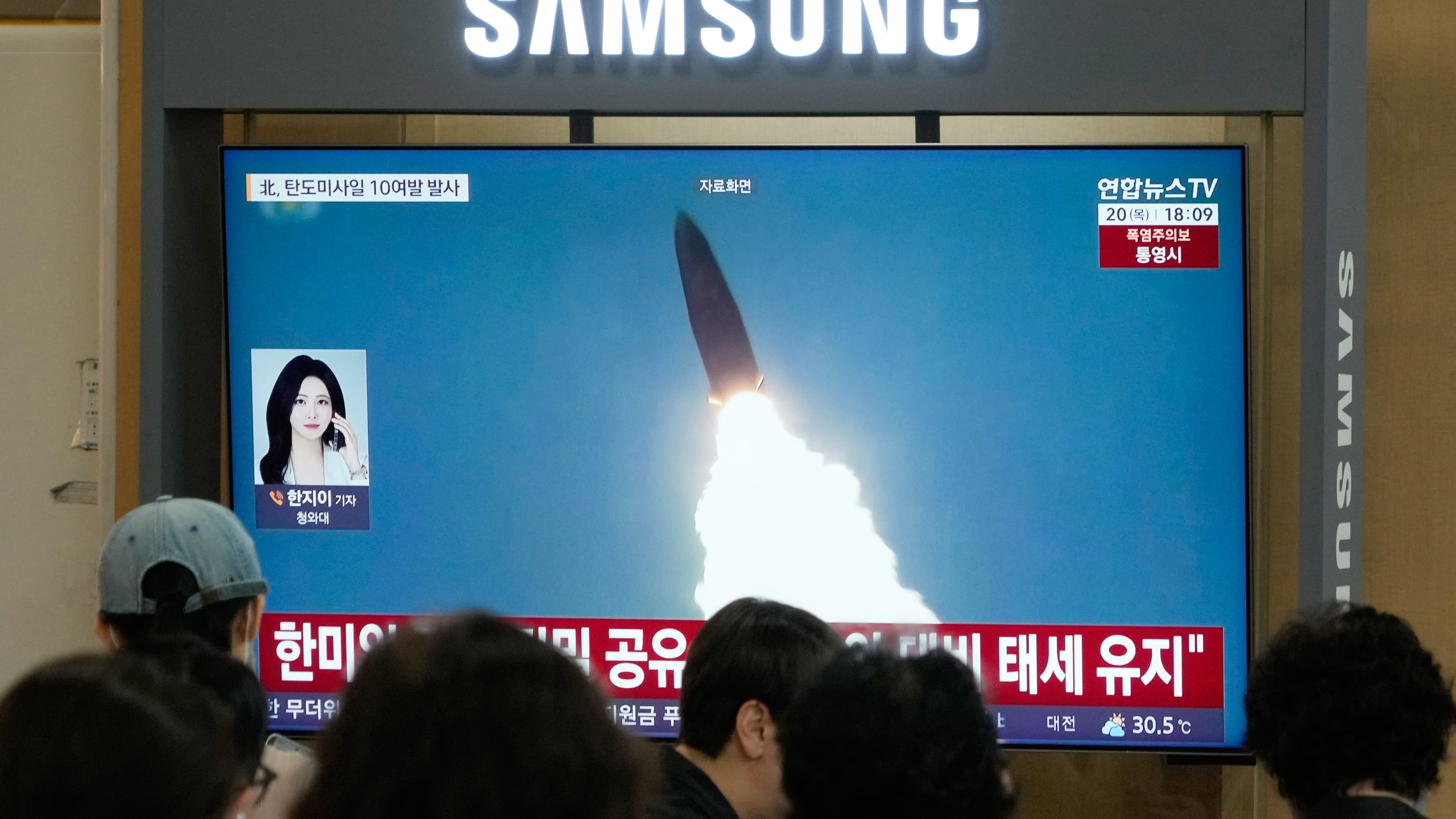 A TV screen shows a file image of North Korea's missile launch during a news program at Seoul Railway Station in Seoul, South Korea, Thursday, Aug. 20, 2026. (AP Photo/Ahn Young-joon)