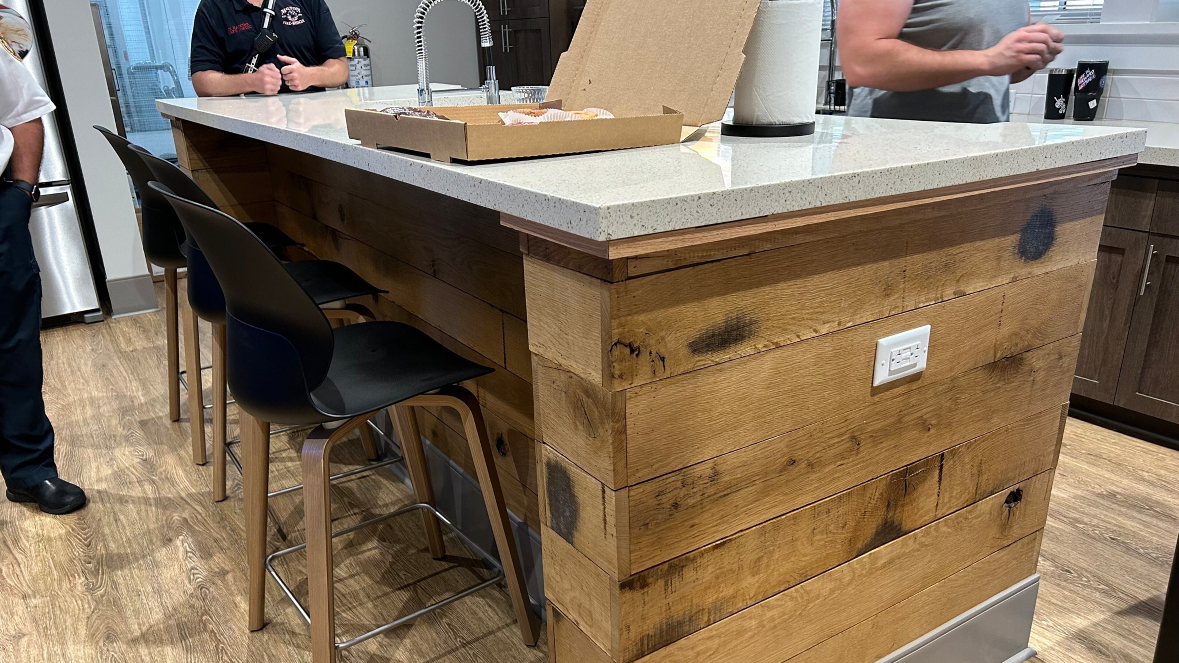 The post oak trees removed from Milton’s Broadwell Pavilion in 2016 have been repurposed as a kitchen island at the newly opened Fire Station 42. (Courtesy City of Milton)