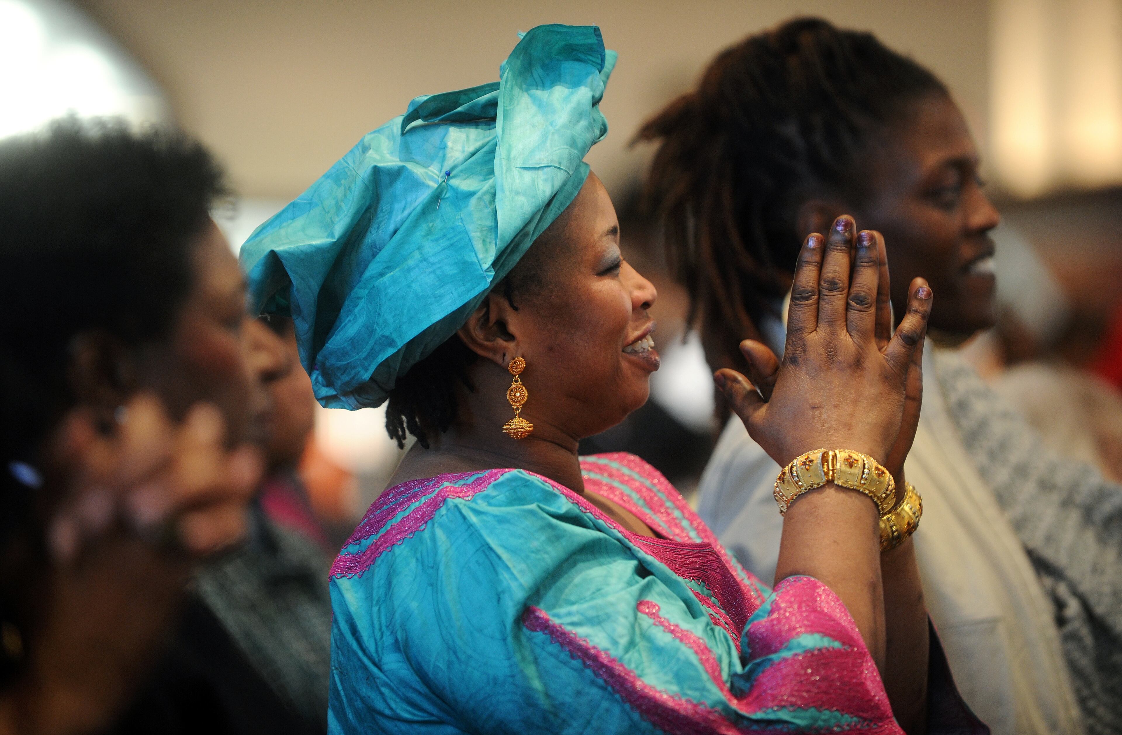 Mariama Jobe enjoys music at the Martin Luther King, Jr. Annual Commemorative Service at Ebenezer Baptist Church in Atlanta Monday, Jan. 21, 2013.
