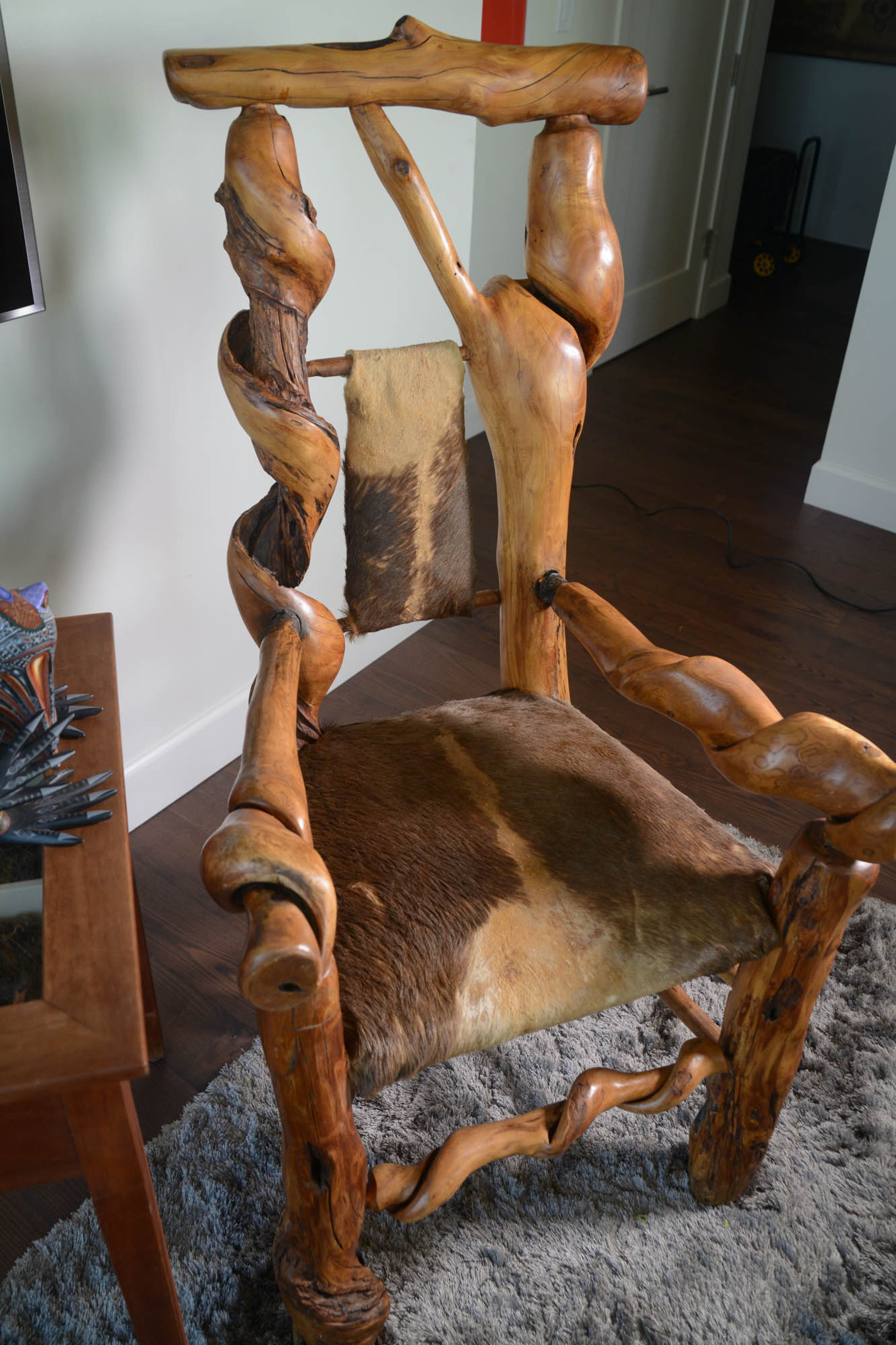 Ever the craftswoman, homeowner Pippa Seichrist constructed this chair from a honeysuckle tree. "Mother Nature did an amazing job on this wood," she said. She covered the chair in wildebeest hide, which she found one day while perusing a taxidermy store. Text by Anna Logan/Fast Copy News Service.