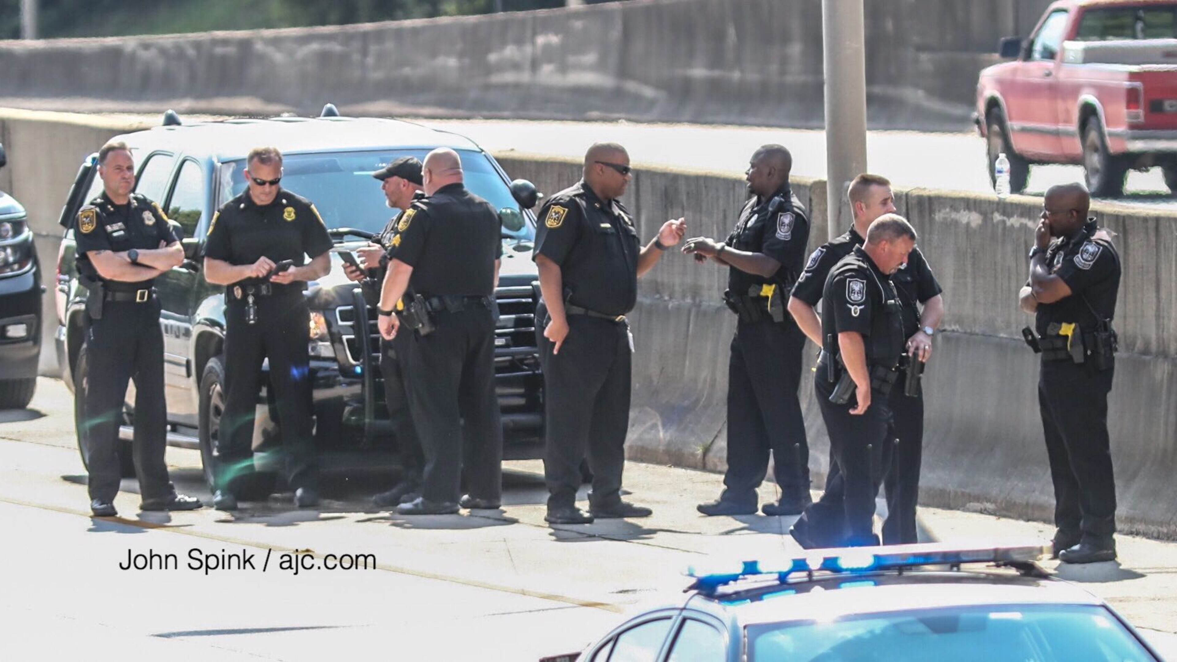 An officer pulled over the driver after discovering the man had a warrant out for his arrest.