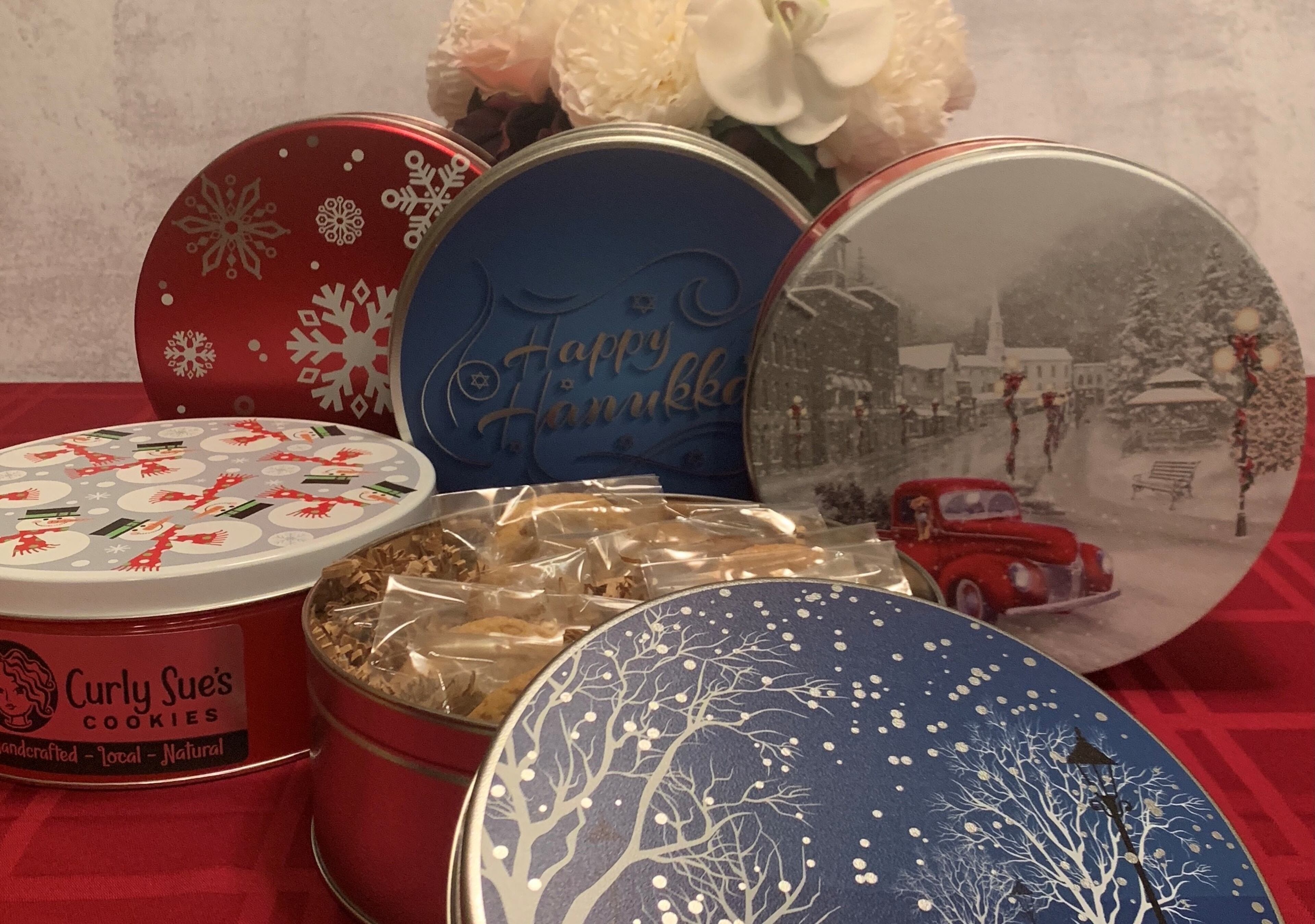 Cookie tins from Curly Sue's Cookies. Courtesy of Curly Sue’s