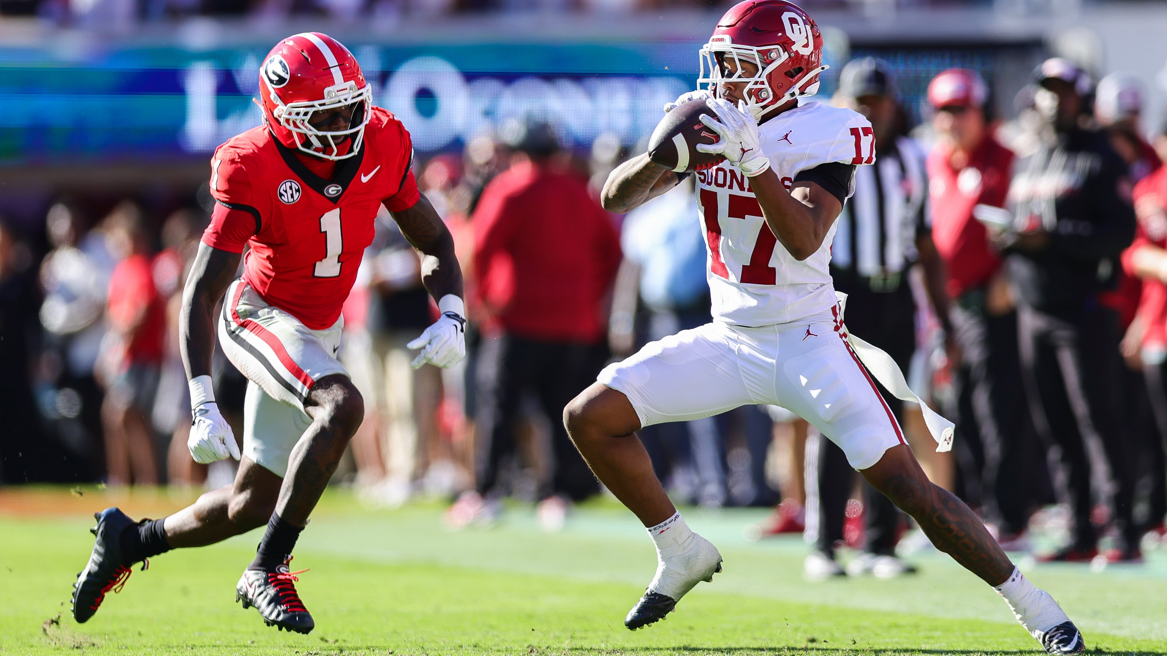 Oklahoma wide receiver Mackenzie Alleyne (right) catches a pass against Georgia defensive back Ellis Robinson IV (left) during the first half of an NCAA college football game, Saturday, Sept. 26, 2026, in Athens, Ga. (Colin Hubbard/AP)