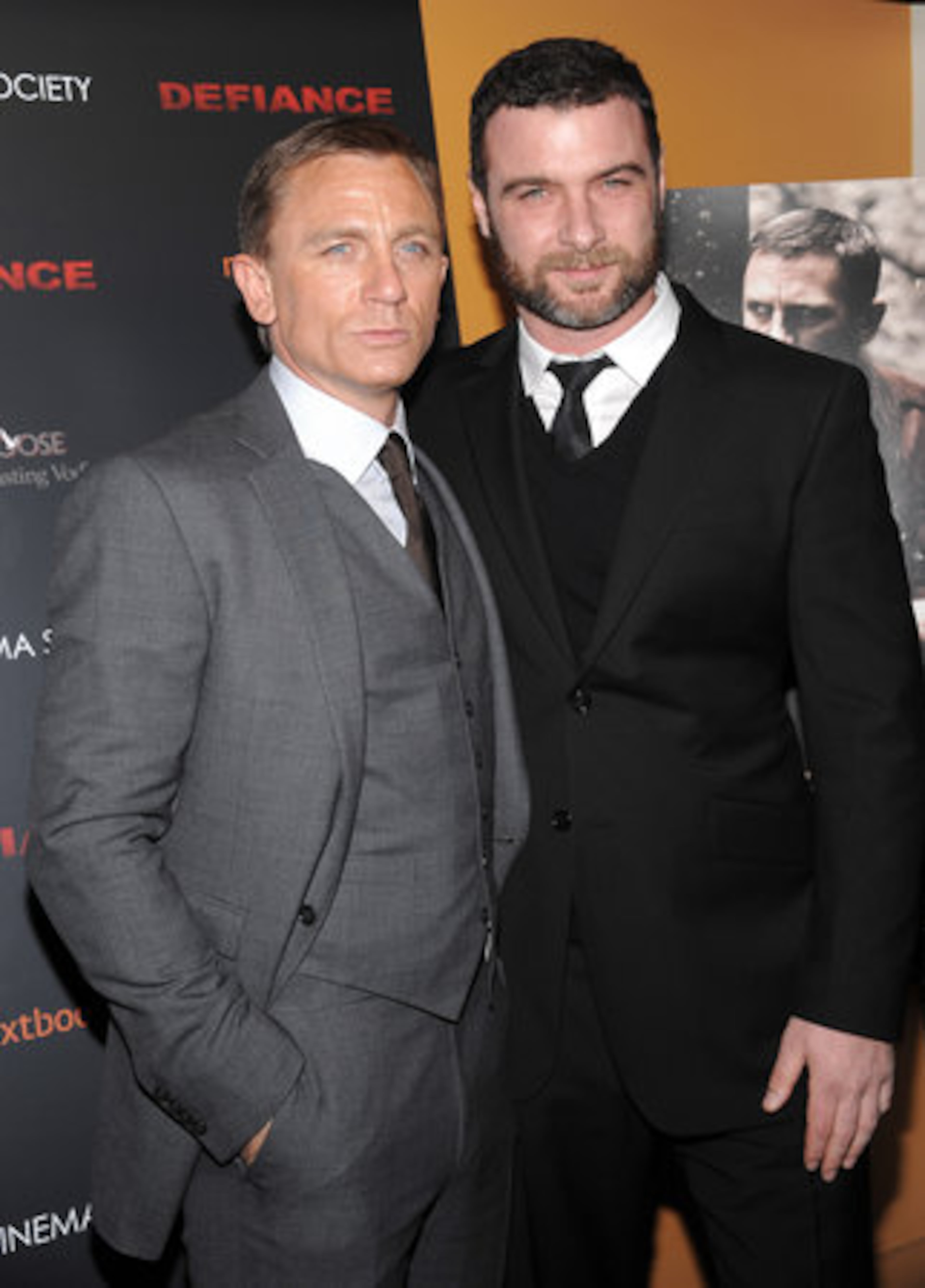 Actors Daniel Craig, left, and Liev Schreiber attend a Cinema Society screening of "Defiance" at The Landmark Sunshine Cinema on Jan. 12, 2009 in New York.
