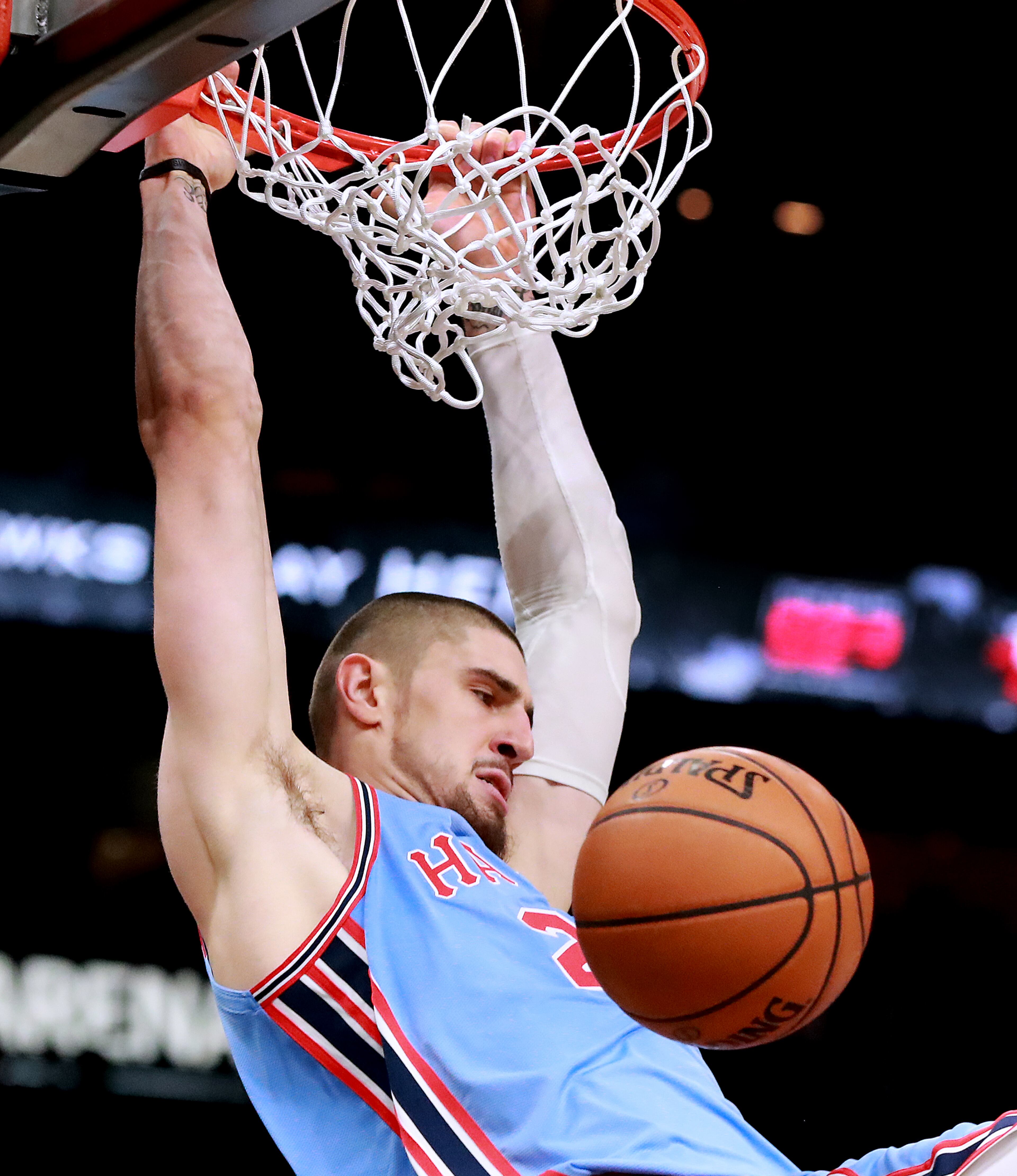 Jan. 15, 2019 Atlanta: Atlanta Hawks center Alex Len slams for two against the Oklahoma City Thunder during the first half in a NBA basketball game on Tuesday, Jan. 15, 2019, at State Farm Arena in Atlanta. Curtis Compton/ccompton@ajc.com