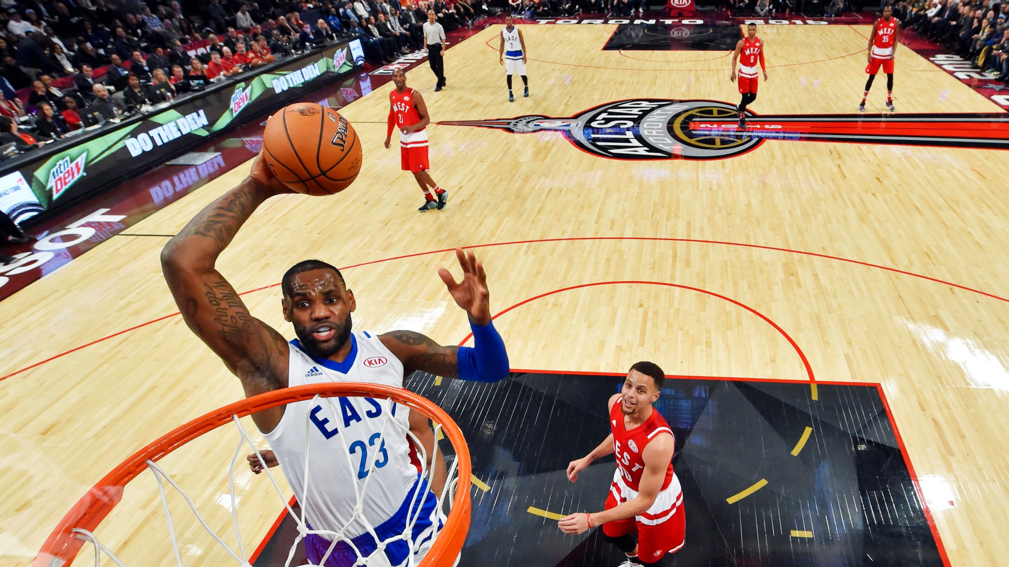 Eastern Conference's LeBron James, of the Cleveland Cavaliers, (23) slam dunks the ball against the Western Conference during second half NBA All-Star Game basketball action in Toronto on Sunday, Feb.14, 2016. (Bob Donnan/The Canadian Press via AP. Pool)
