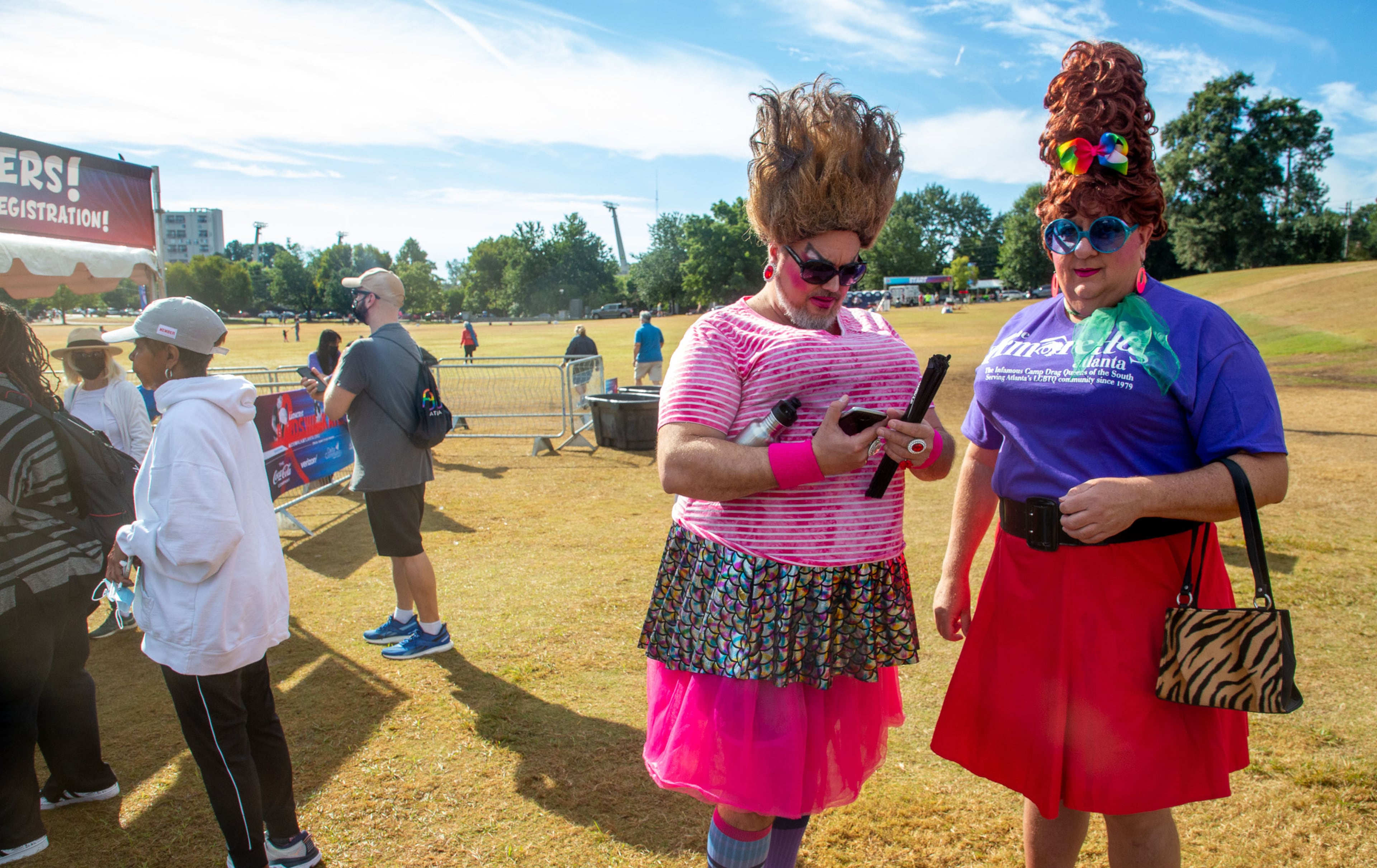Ally (left) and Sid Edeline (AKA Nurse Holly) wait for the start of the annual AIDS Walk Atlanta in Piedmont Park on Saturday, September 25, 2021. The annual event included a 5K run and walk plus a free concert. (Photo: Steve Schaefer for The Atlanta Journal-Constitution)