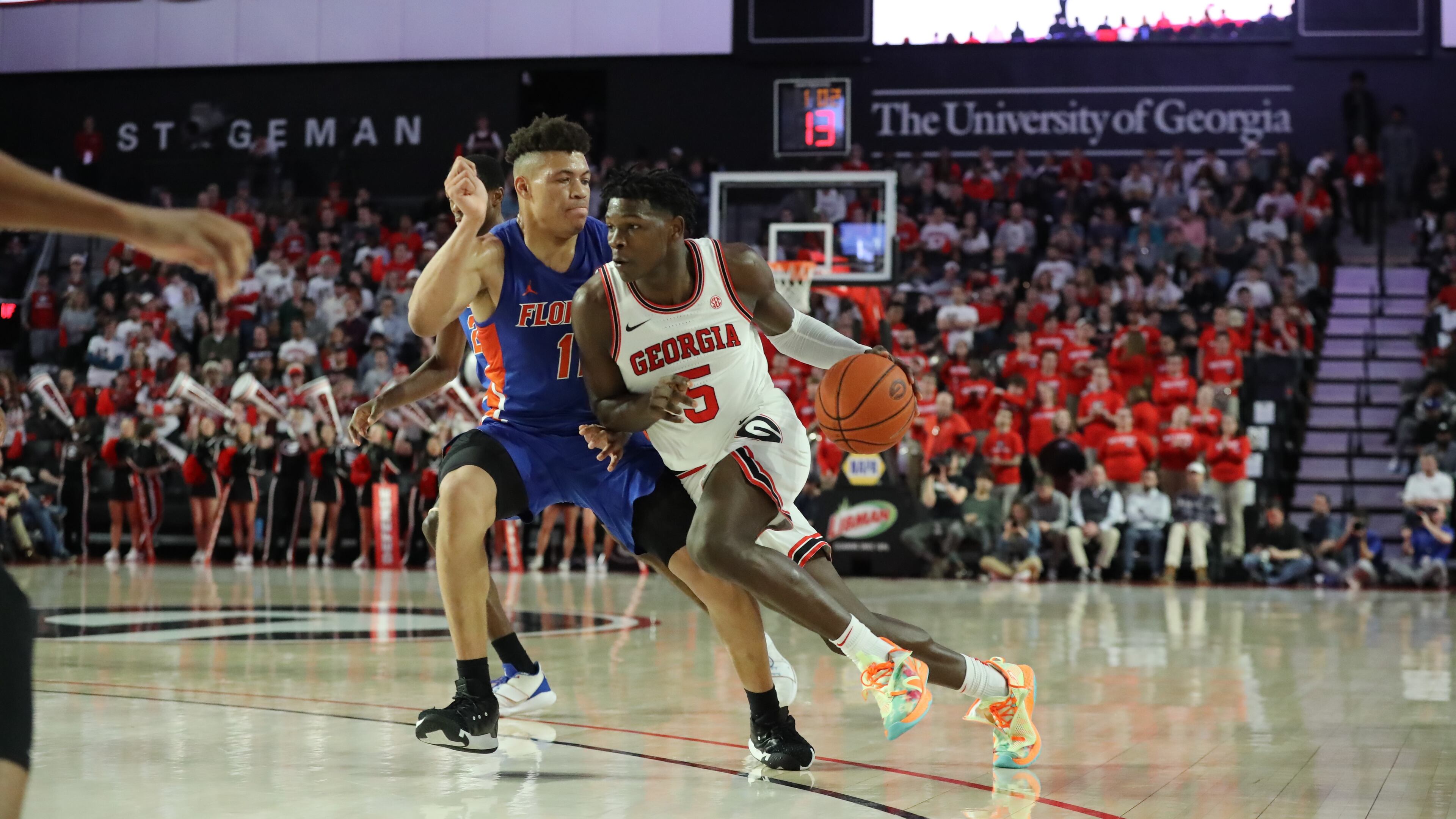 Georgia guard Anthony Edwards drives past Florida forward Keyontae Johnson in a NCAA college basketball game on Wednesday, March 4, 2020, in Athens. Curtis Compton ccompton@ajc.com