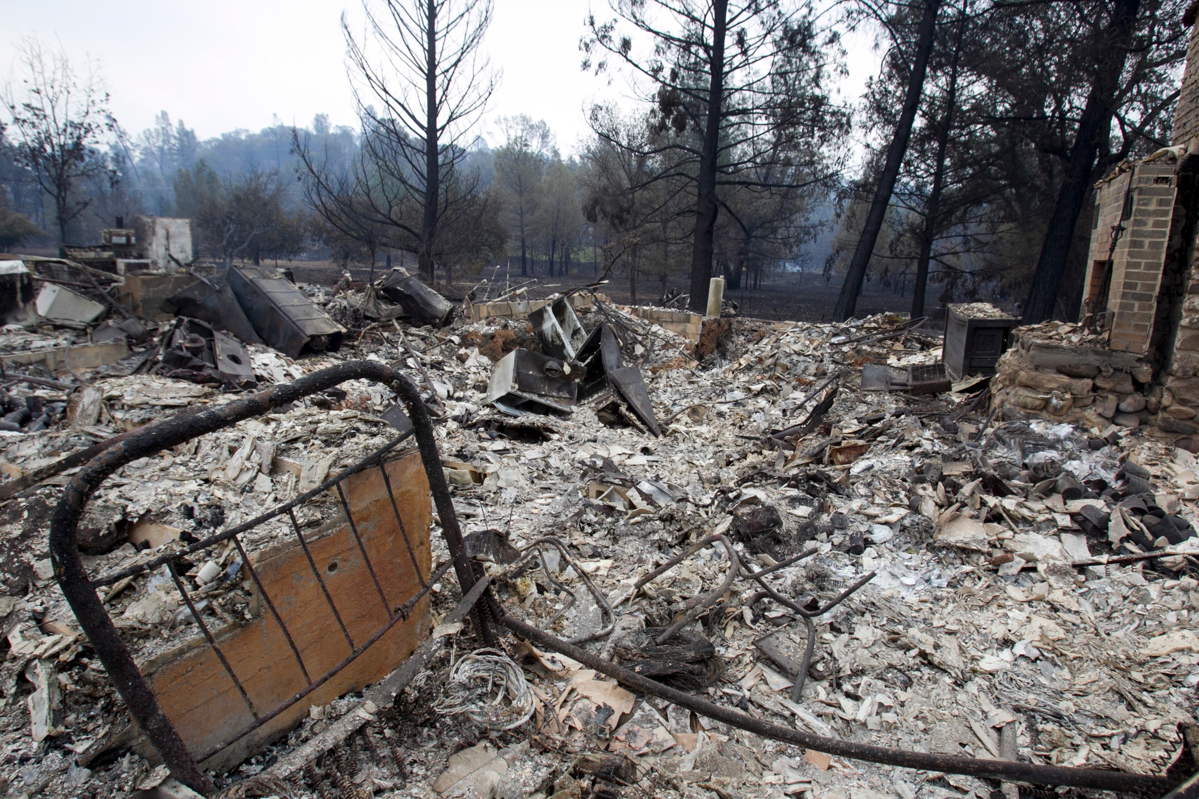 The remains of a home that was destroyed by a wildfire in Middletown, Calif., Sept. 14, 2015. Despite the efforts of thousands of firefighters, three major fires have consumed 270,000 acres, forcing the evacuation of thousands of people, state officials said. (Ilana Panich-Linsman/The New York Times)