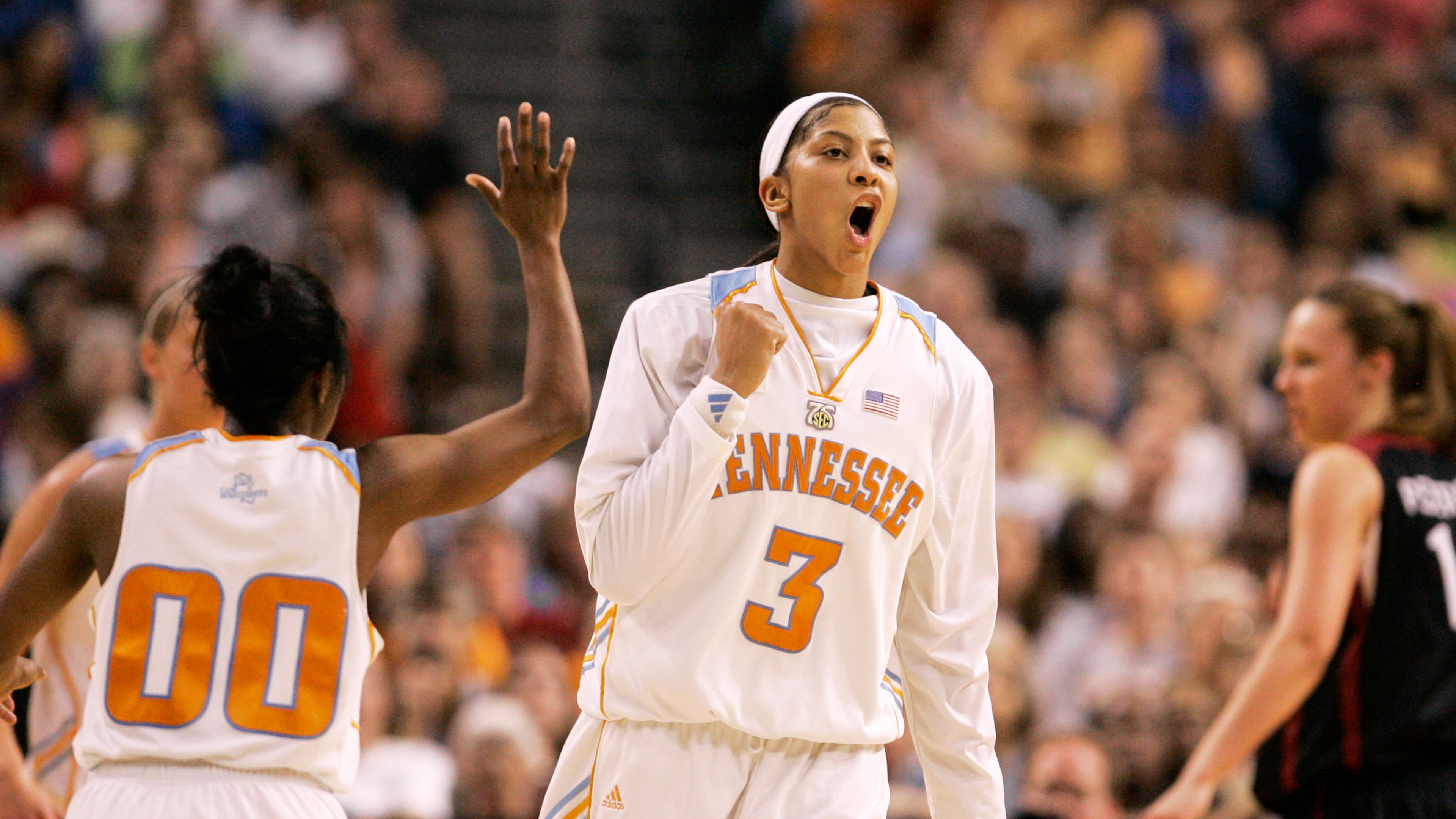 FILE - Candace Parkert (3) celebrates after a shot during the national championship basketball game against Stanford at the NCAA Women's Final Four, April 8, 2008, in Tampa, Fla. (AP Photo/Amy Sancetta, File)