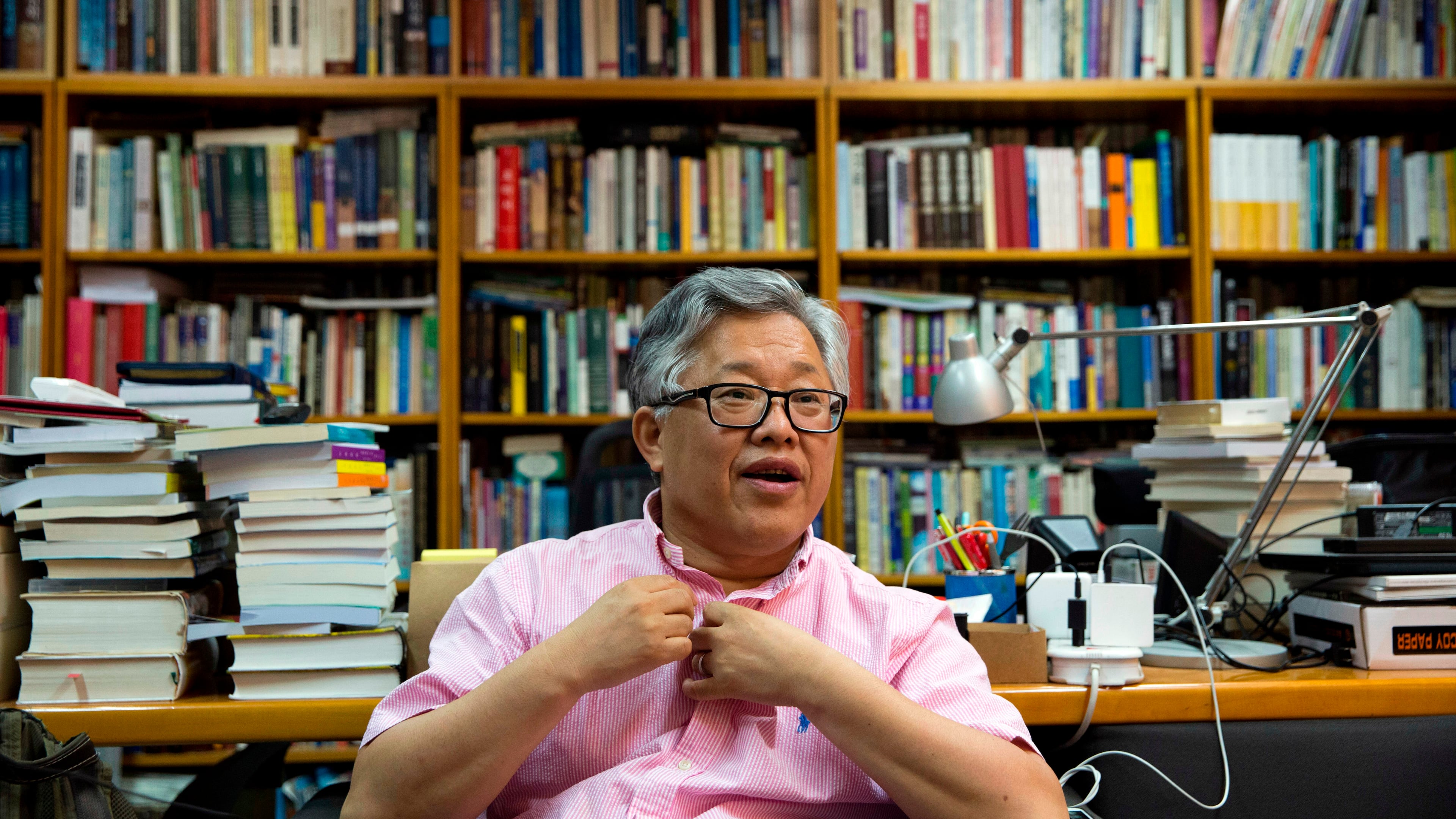 FILE - Pastor Ezra Jin Mingri speaks during an interview at the Zion Church in Beijing, China, Wednesday, Aug. 1, 2018. (AP Photo/Ng Han Guan, file)