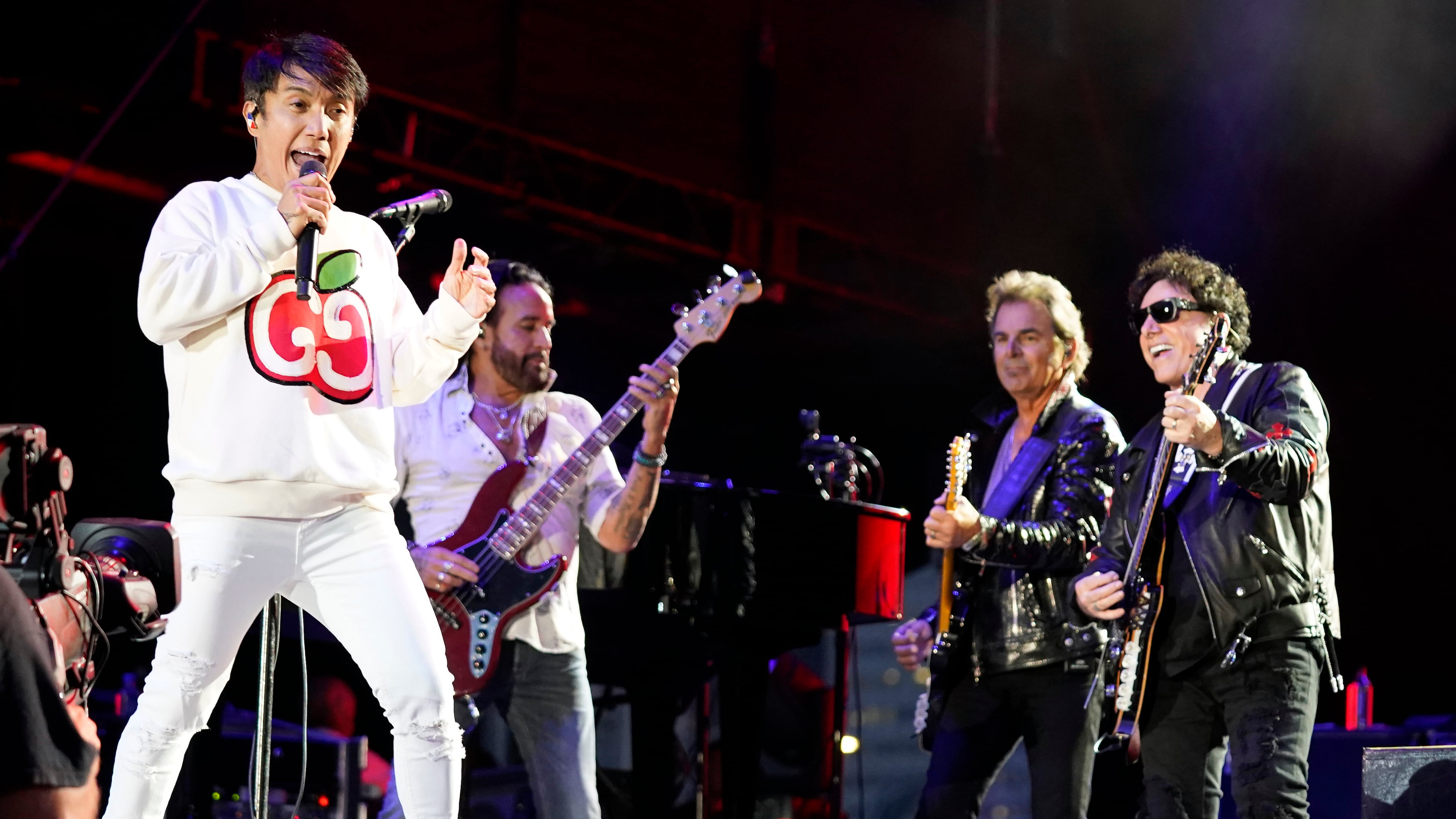 Arnel Pineda, Marco Mendoza, Jonathan Cain and Neal Schon, of the band Journey, perform at Lollapalooza, July 31, 2021, at Grant Park in Chicago. (Rob Grabowski/Invision/AP File)