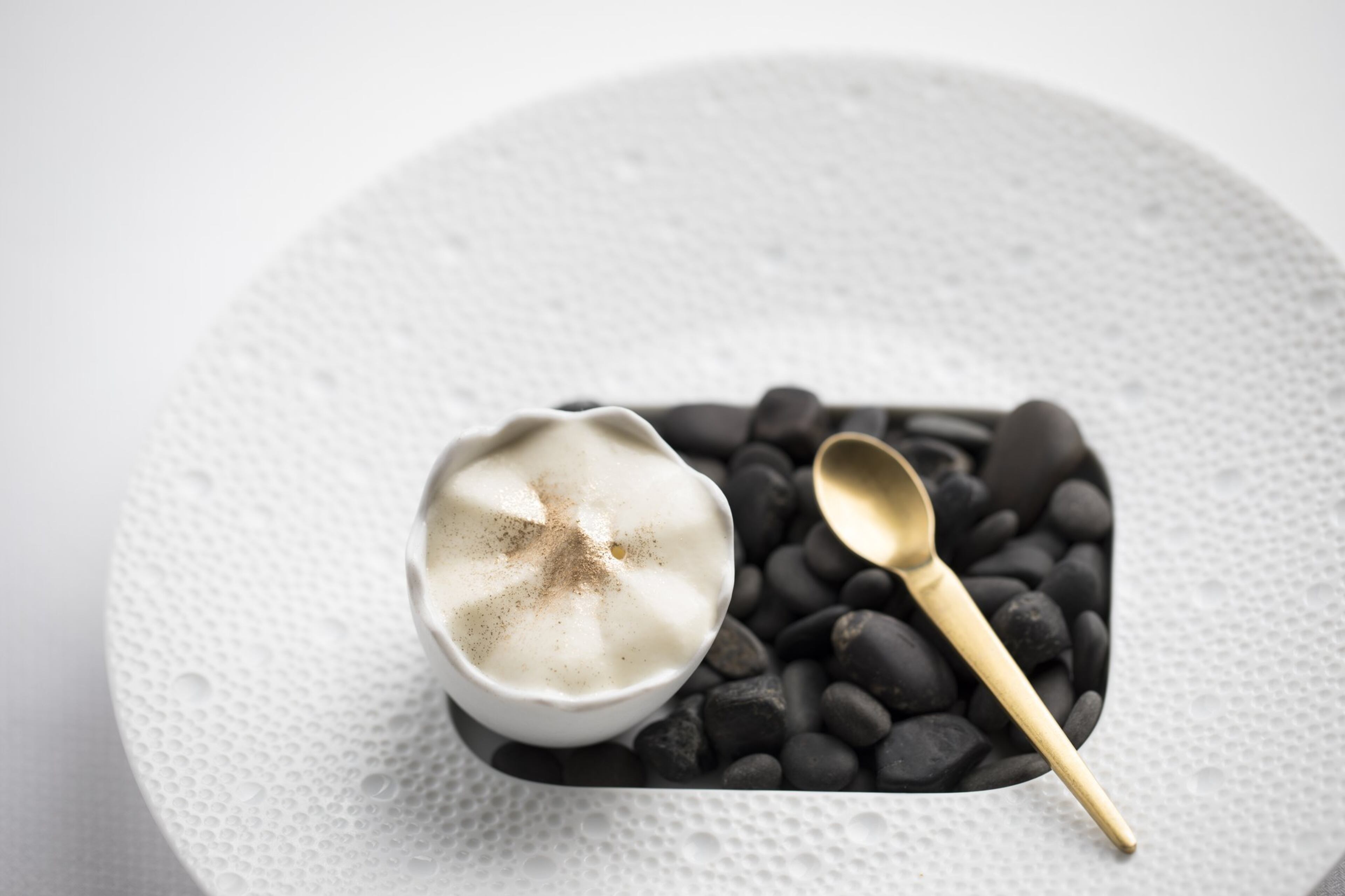 The Perfect Egg is an amuse-bouche with soft-scrambled egg, sherry cream, spinach and celery root foam.