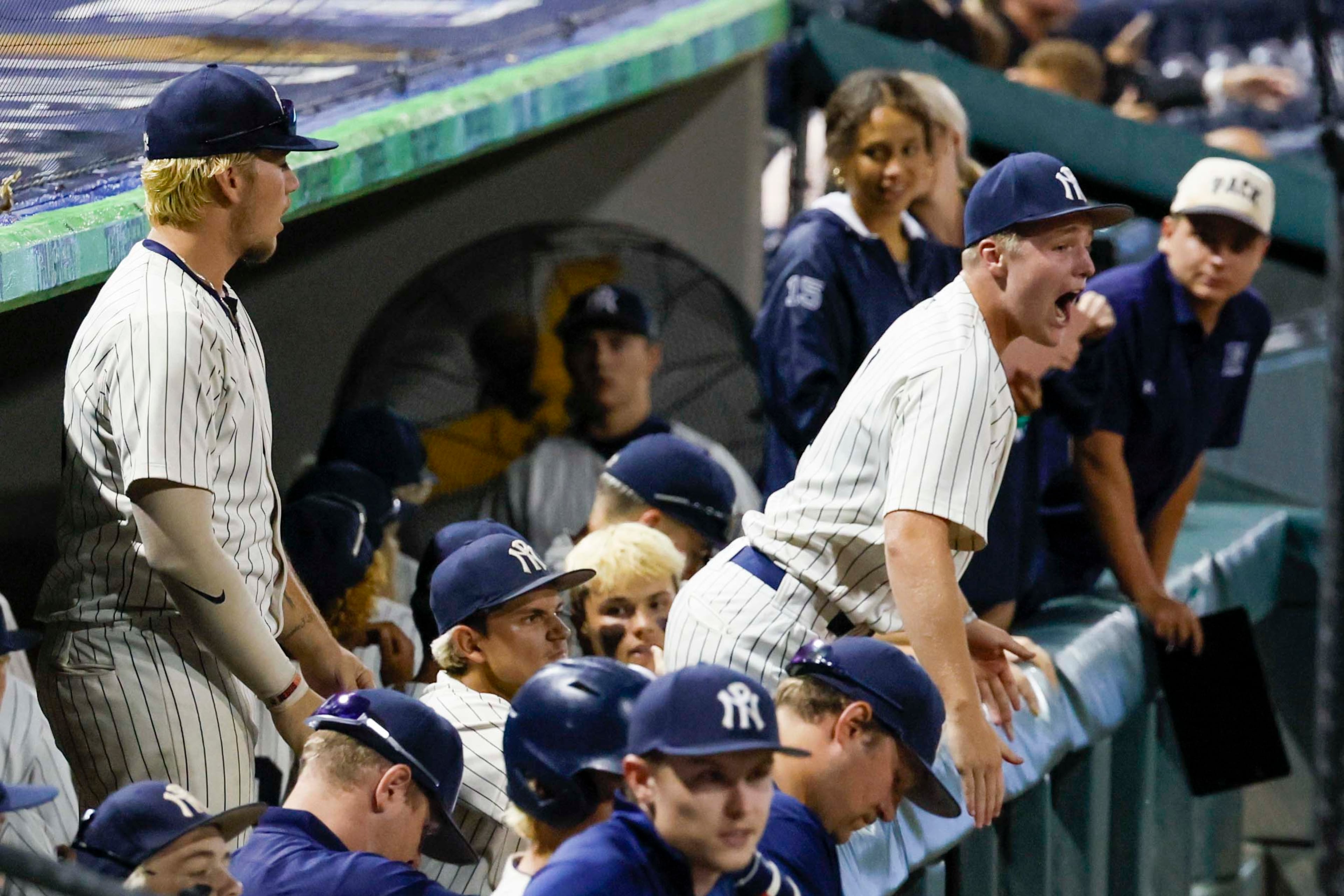 North Paulding players celebrate at the dugout after Wesley Moering scores the first run during Game 1 of the Class 6A GHSA Baseball State Championship Series at Gwinnett Field on Tuesday, May 26, 2026, in Lawrenceville, Ga. (Miguel Martinez/AJC)