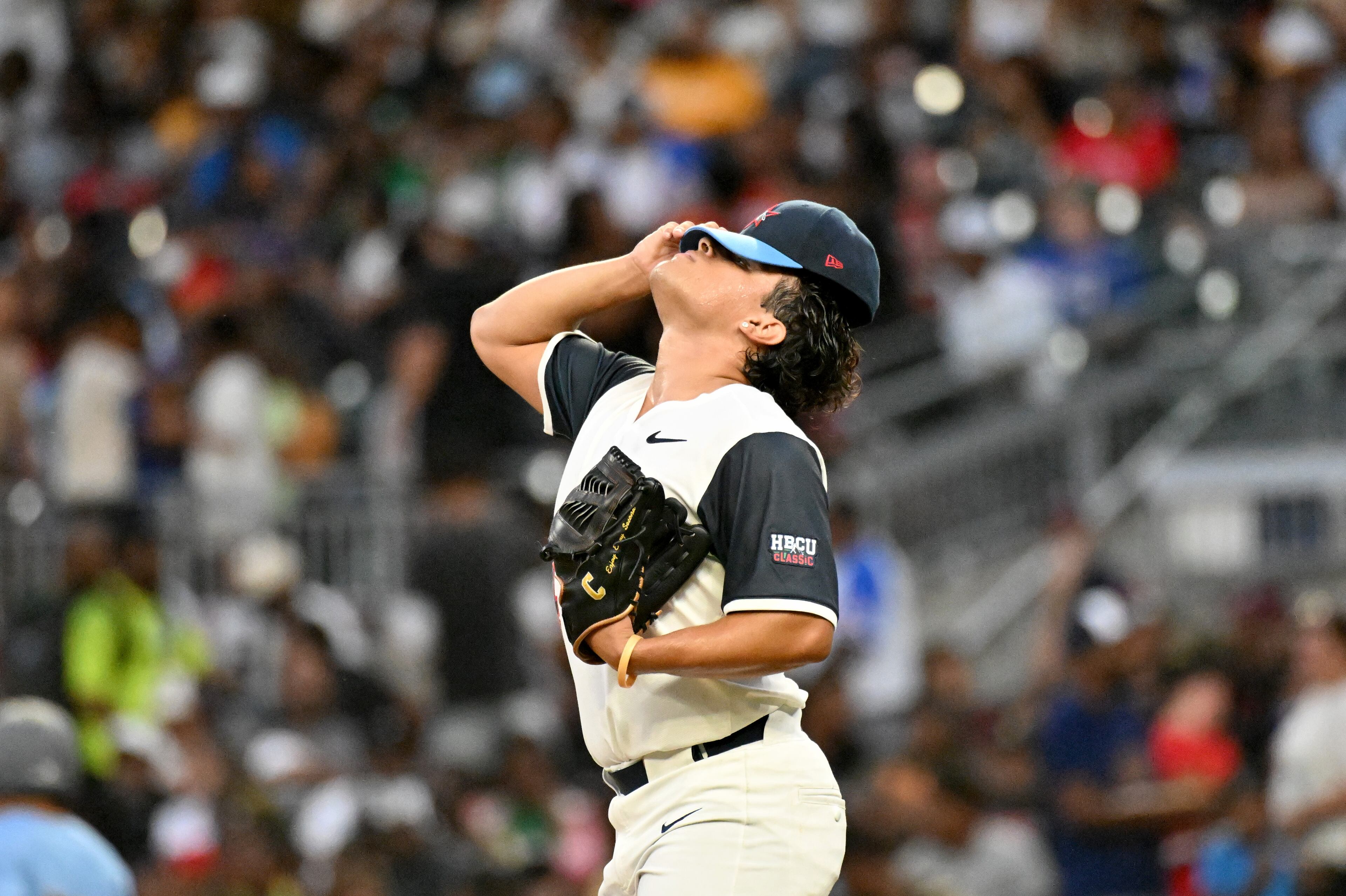 National League's right-handed pitcher Reagan Rivera of Coppin State (14) reacts during the fourth inning of HBCU Swingman Classic at Truist Park, Friday, July 11, 2025, in Atlanta. National League won 7-4 over American League. (Hyosub Shin / AJC)