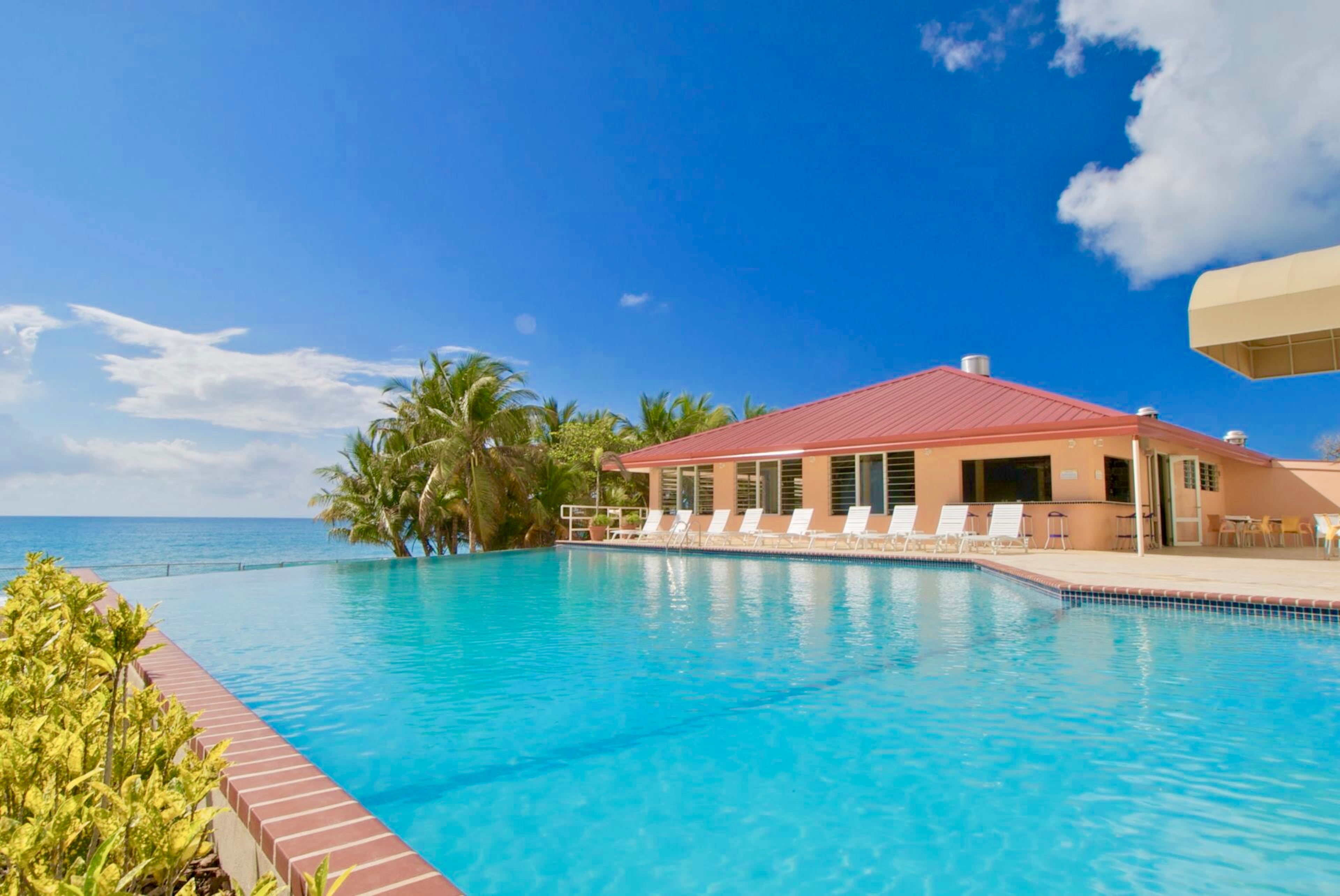 The pristine pool at Parador MaunaCaribe in Maunabo offers a dramatic view of the ocean on Puerto Rico's southeastern coast. Photo Credit: Parador MaunaCaribe
