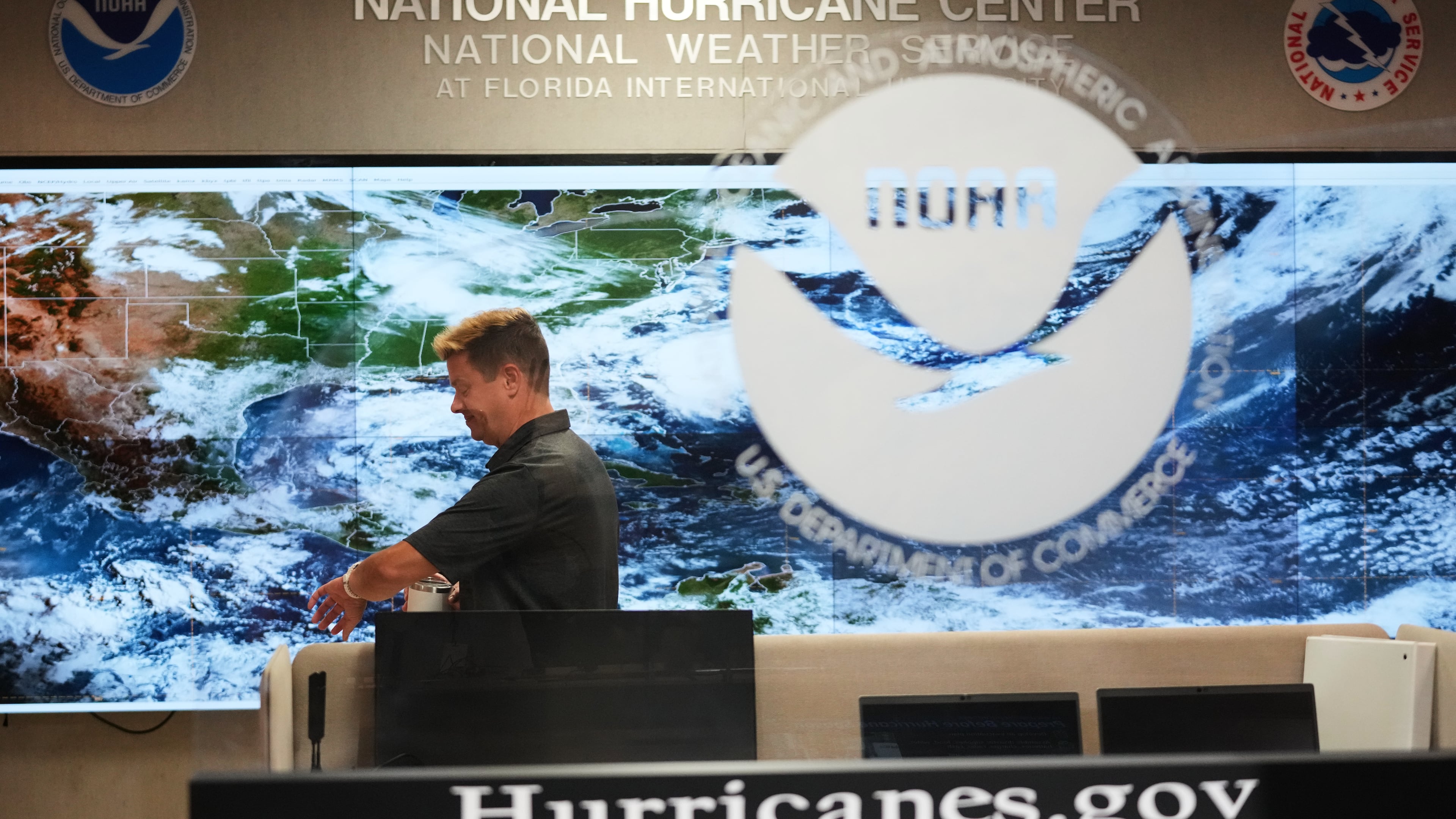 Robbie Berg, Warning Coordinator Meteorologist, works at the National Hurricane Center on the first day of hurricane season, Monday, June 1, 2026, in Miami. (AP Photo/Lynne Sladky)