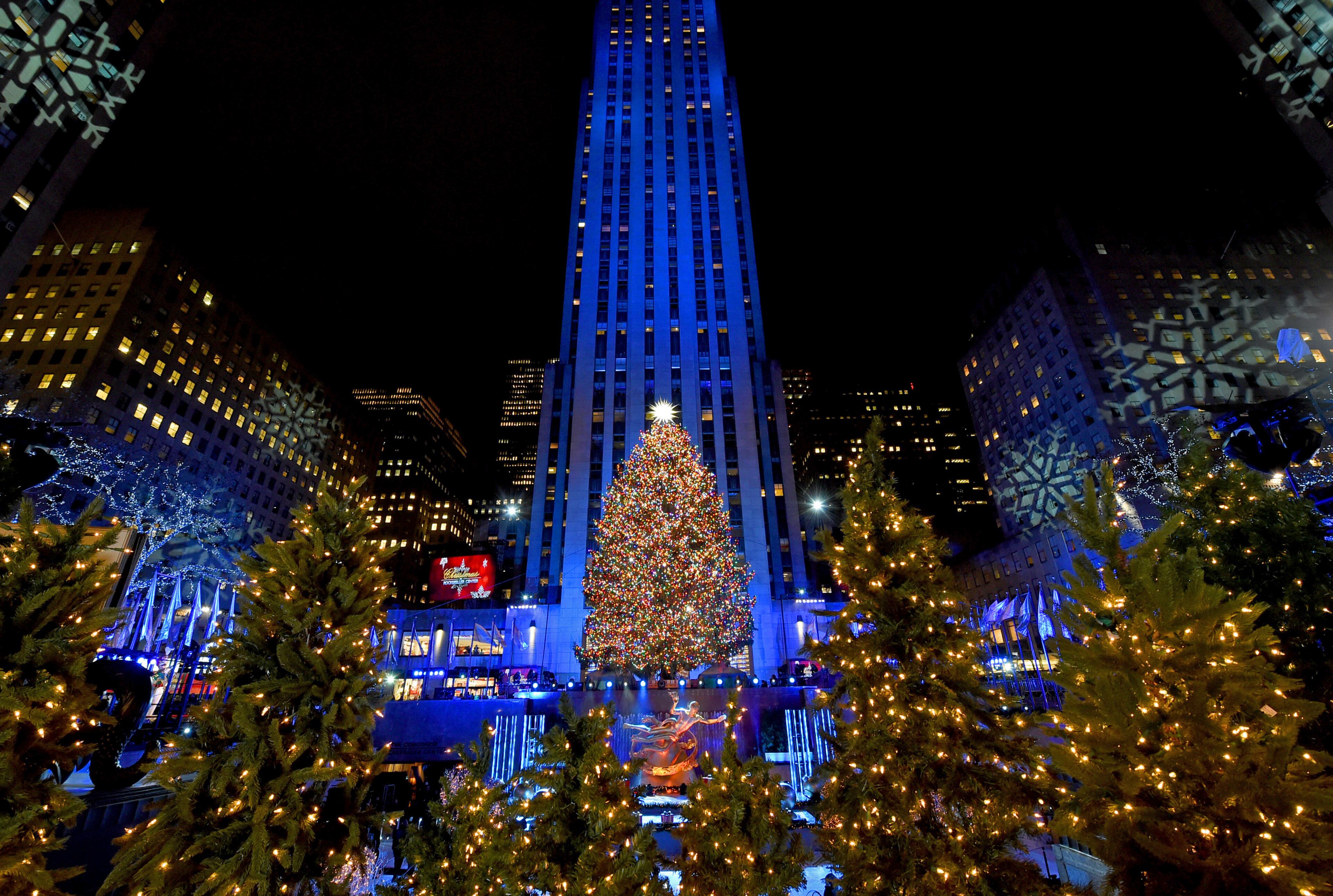 IMAGE DISTRIBUTED FOR TISHMAN SPEYER - The Rockefeller Center Christmas Tree stands lit, Wednesday, Nov. 28, 2018, in New York. The 72-foot tall Norway spruce is covered with more than 50,000 multi-colored LED lights and a new Swarovski star and will remain lit until Jan. 7. (Diane Bondareff/AP Images for Tishman Speyer)