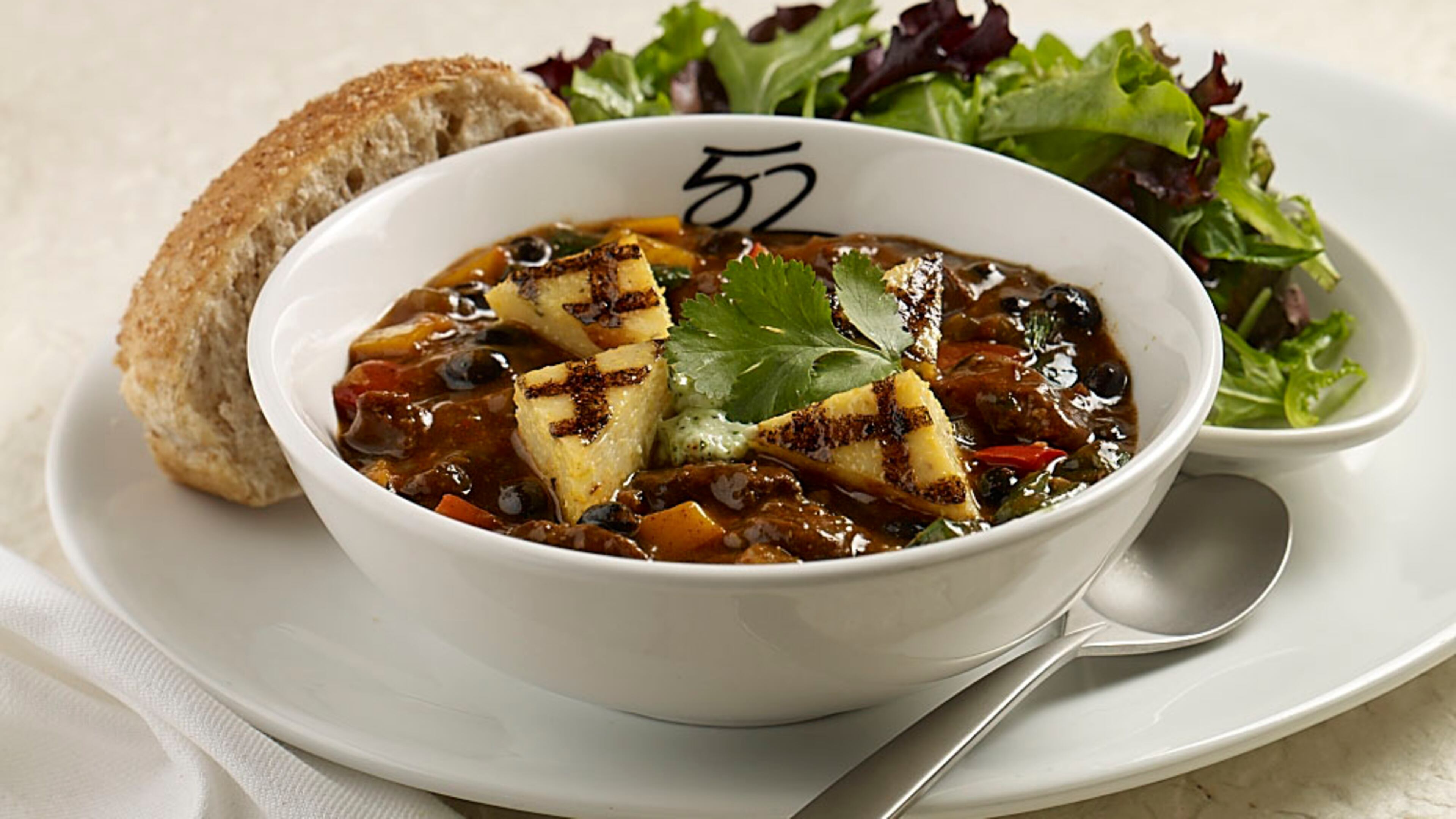 Atlanta restaurant Seasons 52 offers a dish of beef and black bean chili. Beef can be substituted with deer meat to make venison chili.