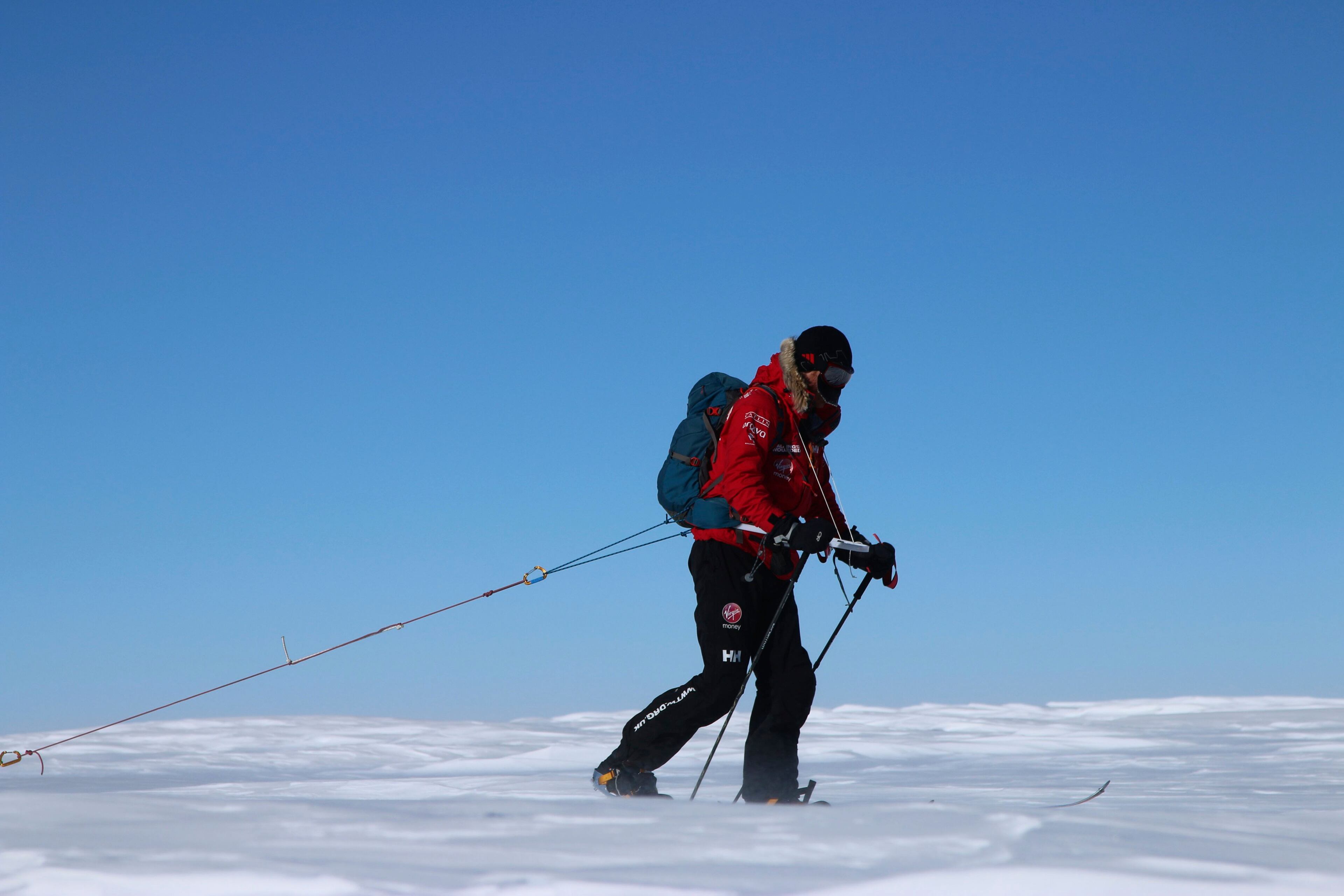 Prince Harry leads team UK on the first day of the Virgin Money South Pole Allied Challenge 2013 expedition in Antarctica December 1, 2013. Prince Harry set off on Sunday on his 300 kilometre (186 miles) walk to the South Pole for the charity Walking With The Wounded (WWTW) to raise money for wounded servicemen and women. The Virgin Money South Pole Allied Challenge 2013, of which Harry is patron, will see the participants race across three degrees to the South Pole. All 12 injured service personnel from Britain, America, Canada and Australia have overcome life-changing injuries and undertaken challenging training programmes to prepare themselves for the conditions they will face in Antarctica. Trekking around up to 20km (12 miles) per day, the teams will endure temperatures as low as minus 45 centigrades (minus 113 Fahrenheit) and 80 kph (50 mph) winds as they pull their 70 kg (154 pound) sleds, known as pulks, towards the southernmost point on the globe. Picture taken December 1, 2013. REUTERS/Victoria Nicholson/Walking With the Wounded