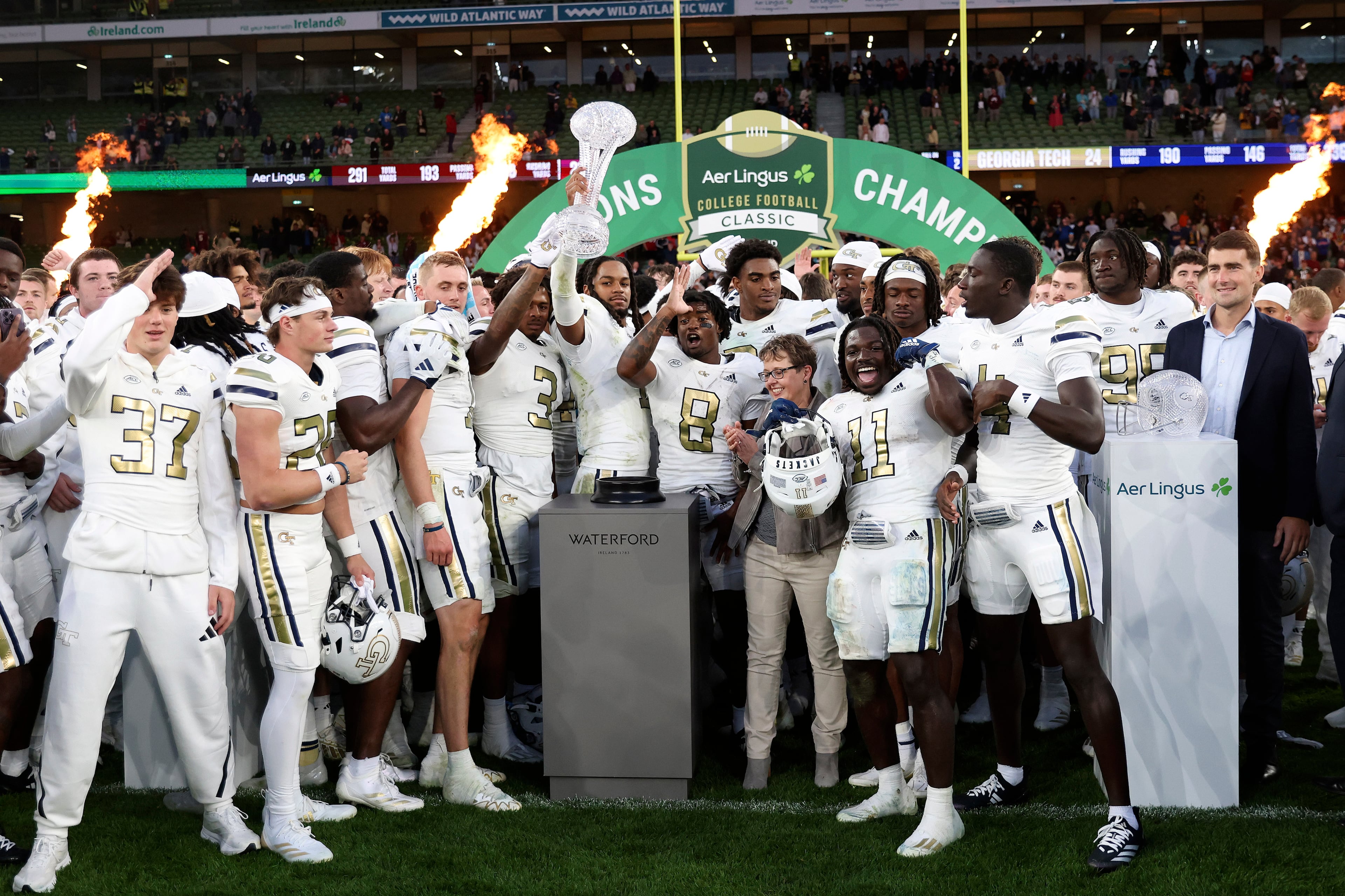Georgia Tech players celebrate after beating Florida State 24-21 at the Aviva Stadium in Dublin, Saturday, Aug. 24, 2024. (AP Photo/Peter Morrison)