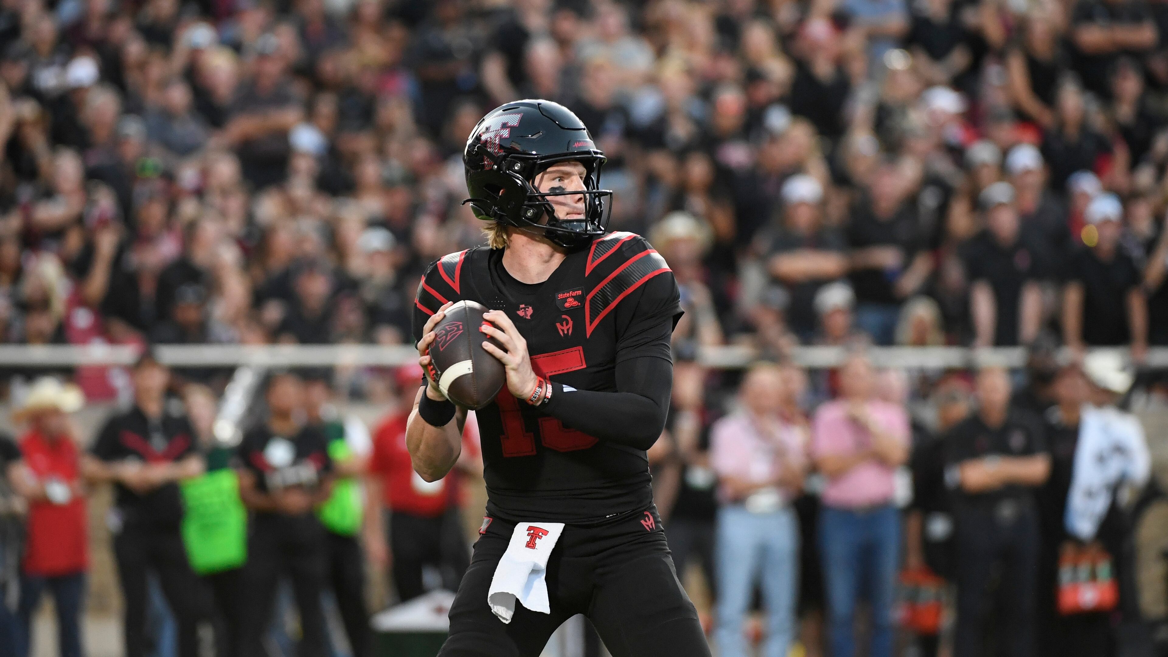 Texas Tech quarterback Will Hammond drops back to throw the ball against Houston during the first half of an NCAA college football game Friday, Sept. 18, 2026, in Lubbock, Texas. (AP Photo/Justin Rex)