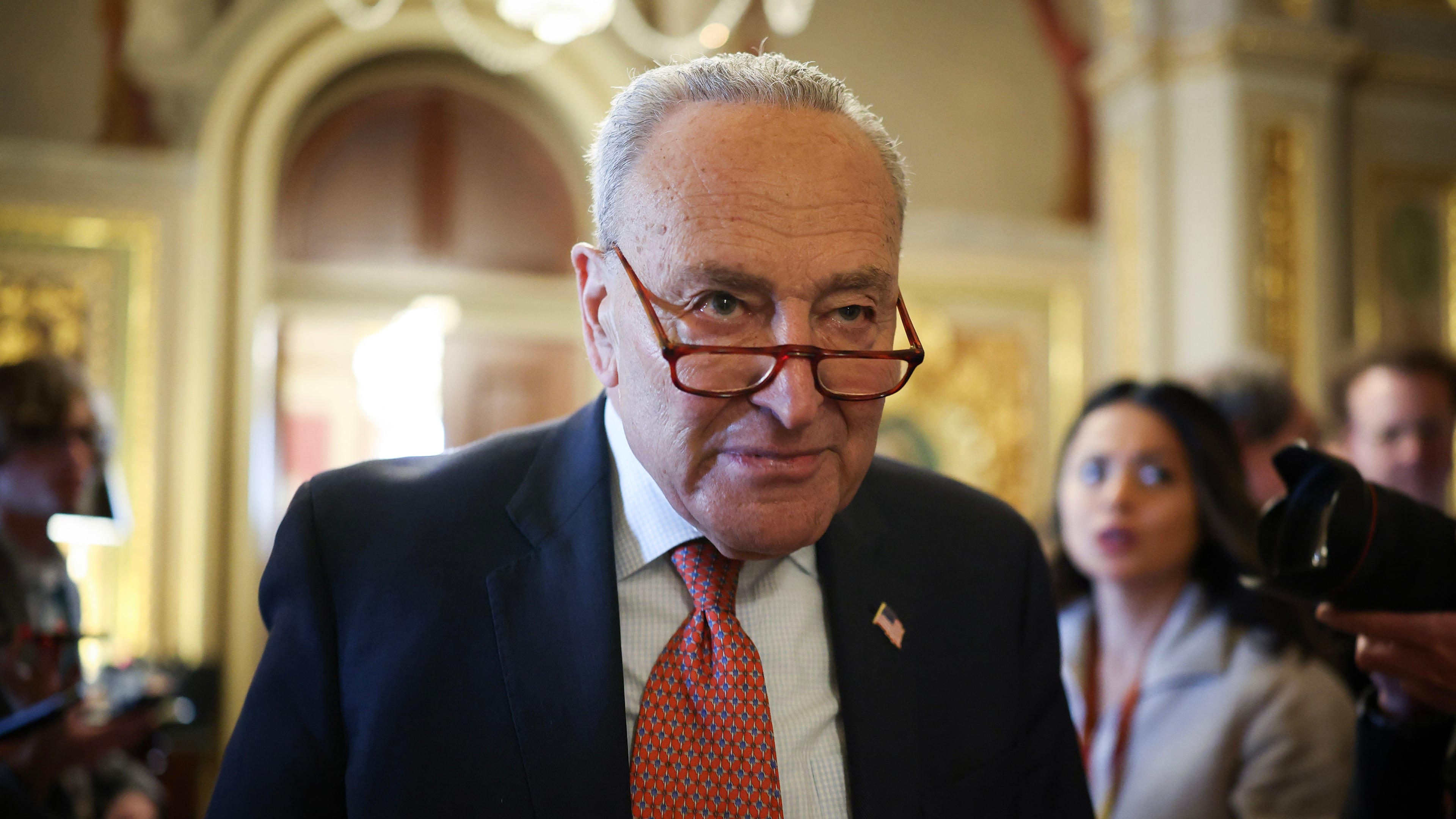 Senate Minority Leader Chuck Schumer, D-N.Y., leaves the Democratic caucus lunch at the U.S. Capitol on March 13, 2025, in Washington, D.C. (Kayla Bartkowski/Getty Images/TNS)