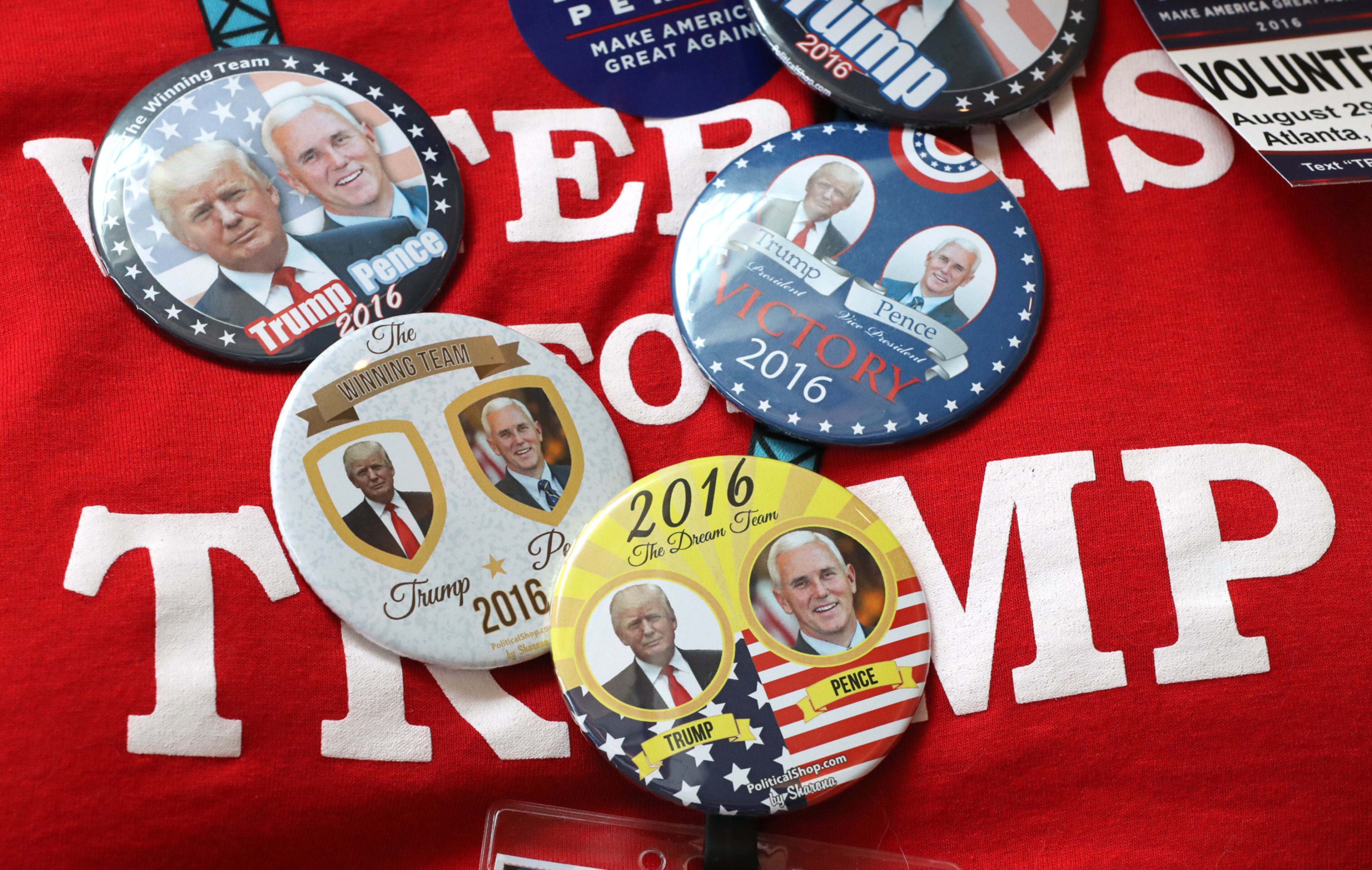 Matthew Hardwick wears an assortment of Trump-Pence buttons during Mike Pence's campaign stop at the Cobb-Marietta Coliseum & Exhibit Hall Authority on Monday, August 29, 2016, in Marietta. Curtis Compton /ccompton@ajc.com