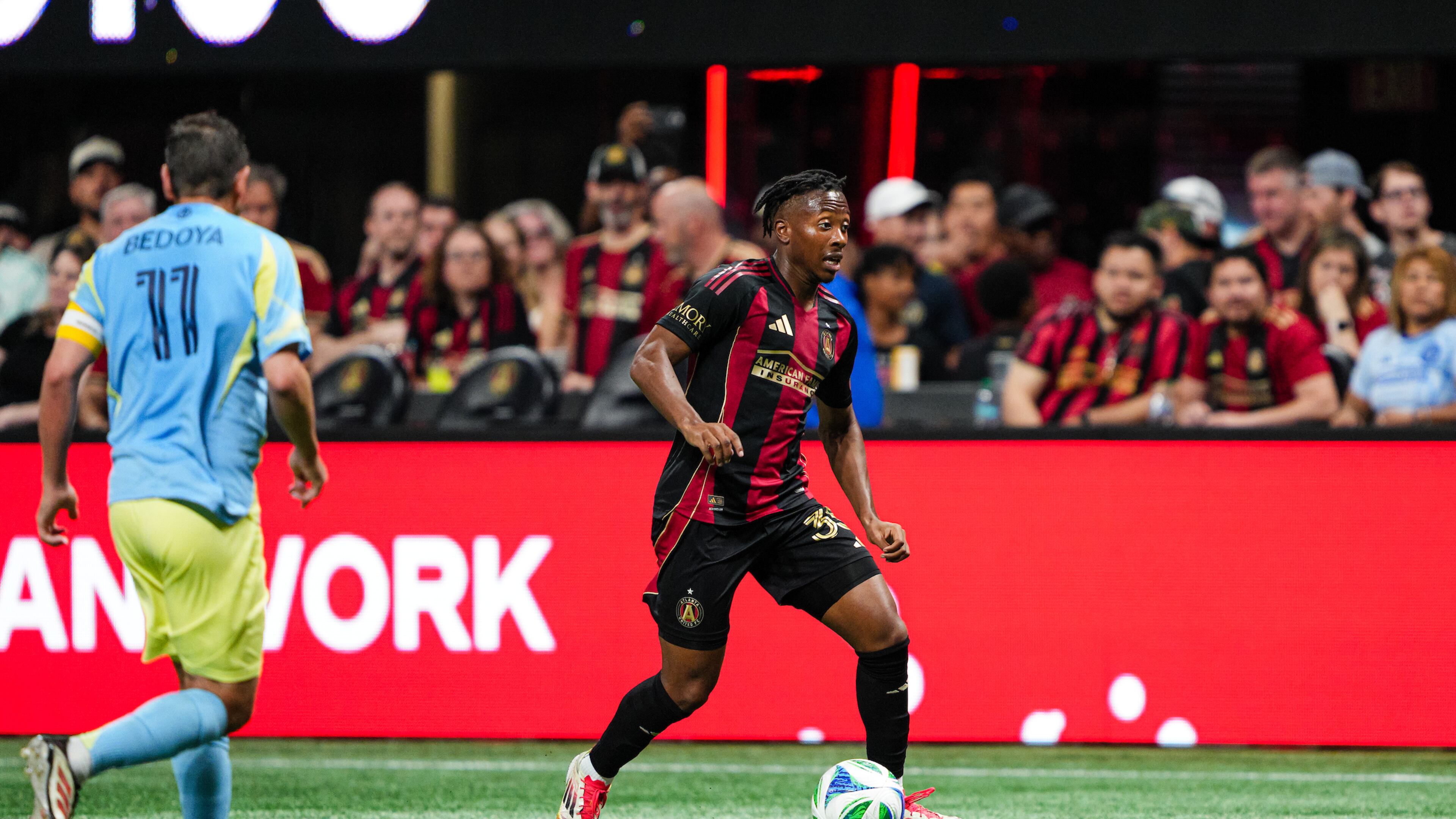 Atlanta United midfielder Jay Fortune (center) controls the ball Saturday against the Philadelphia Union at Mercedes-Benz Stadium in Atlanta. (Matthew Grimes/Atlanta United)