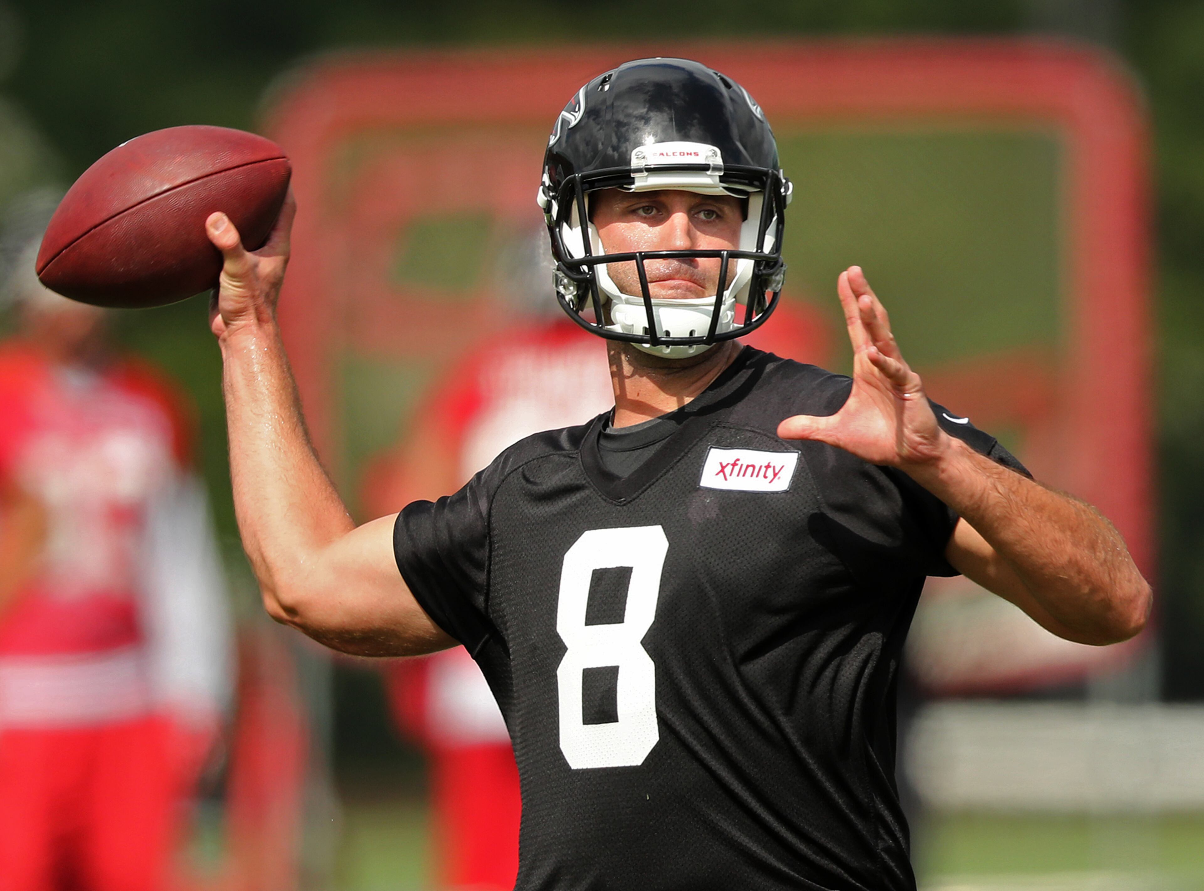 Falcons backup quarterback Matt Schaub throws a pass during the first day of training camp on Thursday, July 28, 2016, in Flowery Branch. Curtis Compton /ccompton@ajc.com