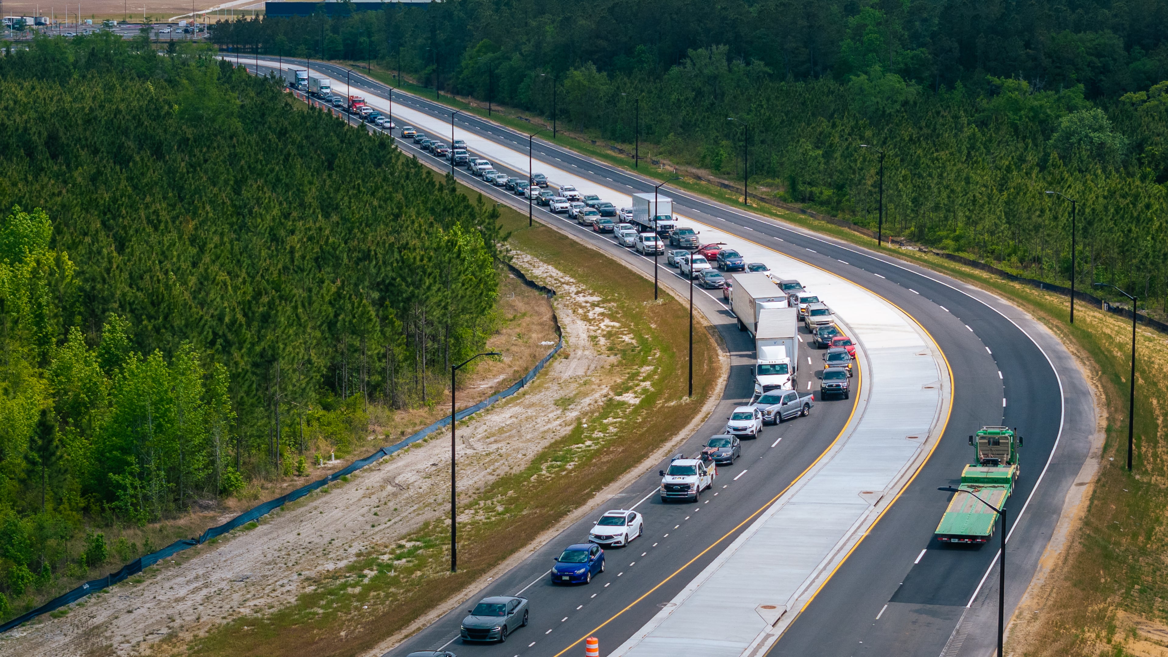Traffic congestion on Genesis Dr. and U.S. Hwy 280 after a shift change at the Hyundai Metaplant in Bryan County, GA on April 23, 2025. (Justin Taylor for The Atlanta Journal-Constitution)