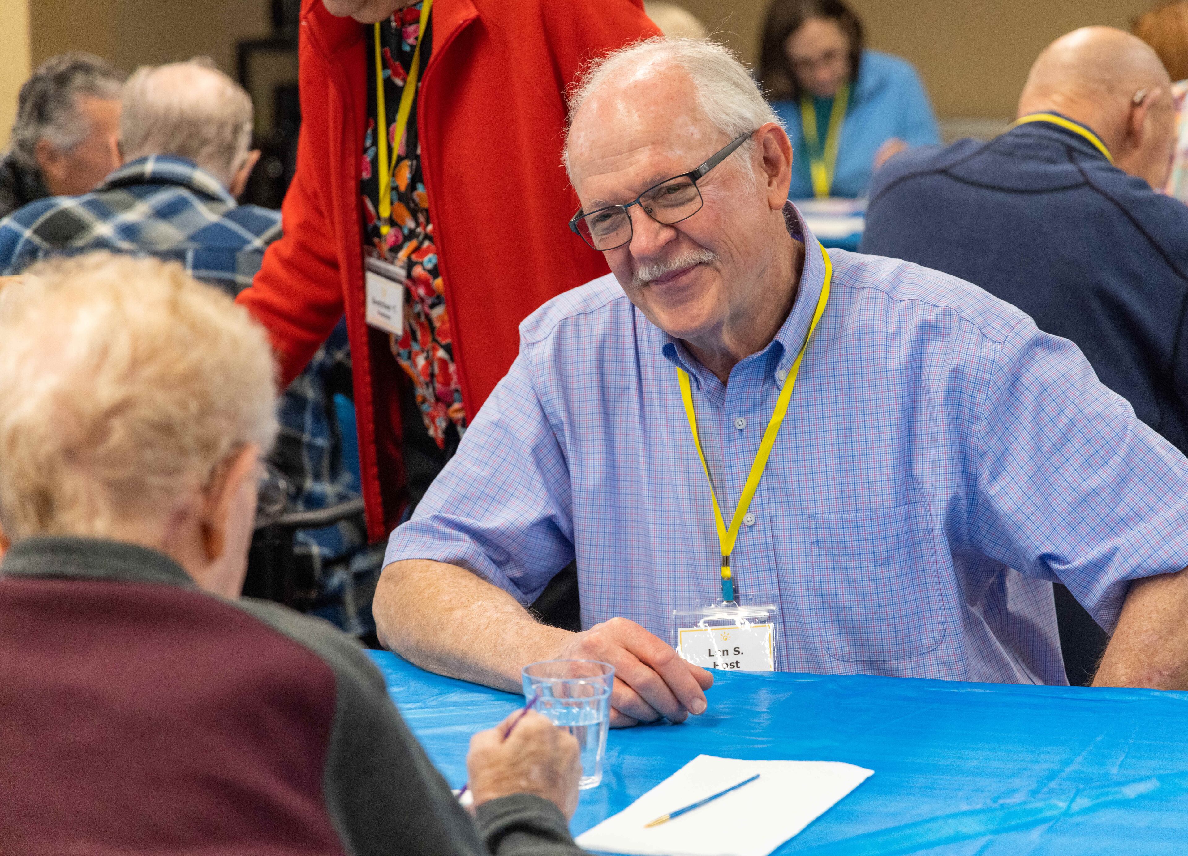 Volunteer Len Sinclair helps a member work on art project together during a Respite Care Atlanta meeting at Second-Ponce de Leon Baptist Church in Atlanta.
PHIL SKINNER FOR THE ATLANTA JOURNAL-CONSTITUTION