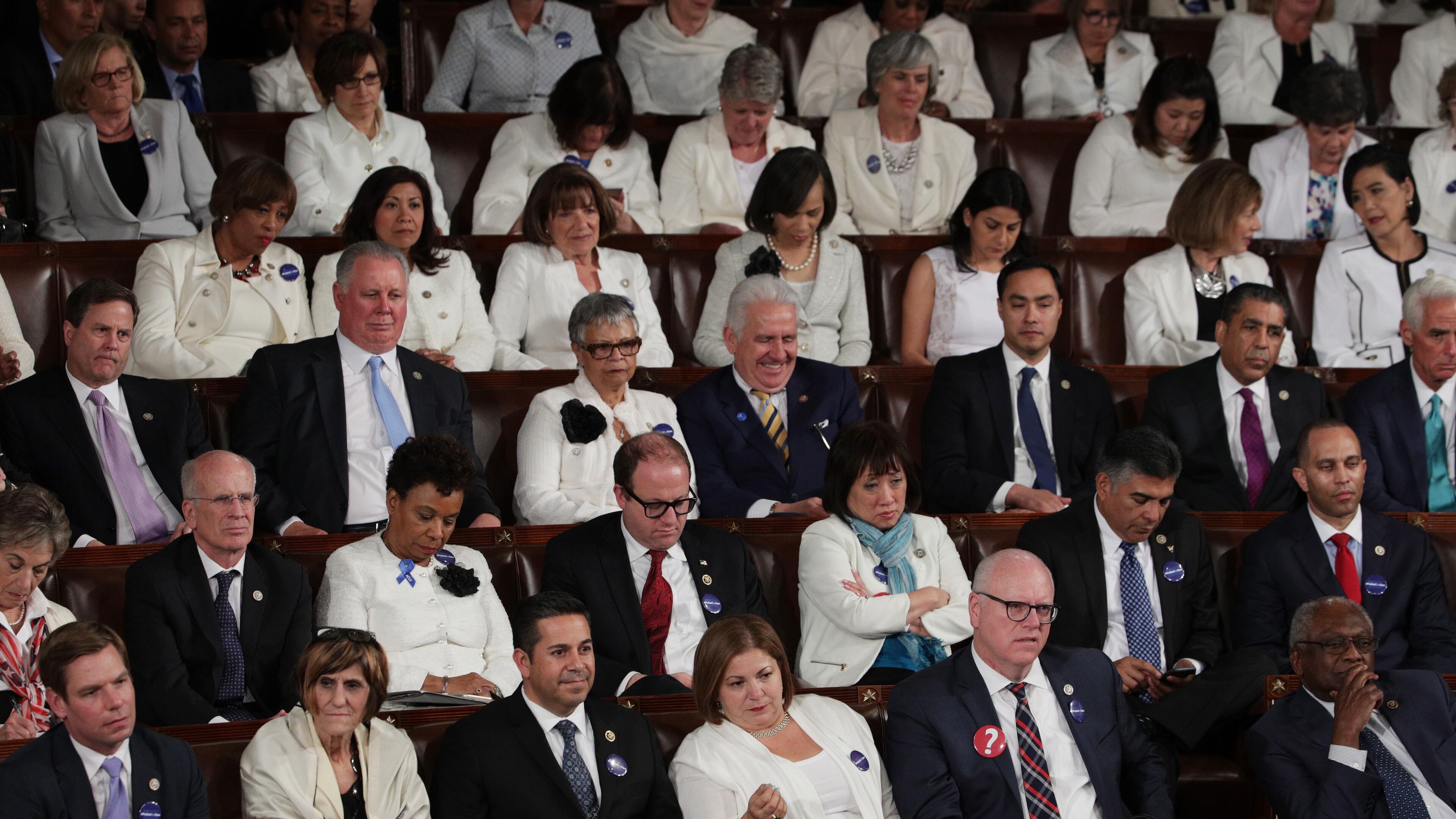 Members of Congress look on as President Donald Trump addresses a joint session on Feb. 28, 2017, in the House chamber of the U.S. Capitol in Washington, D.C.