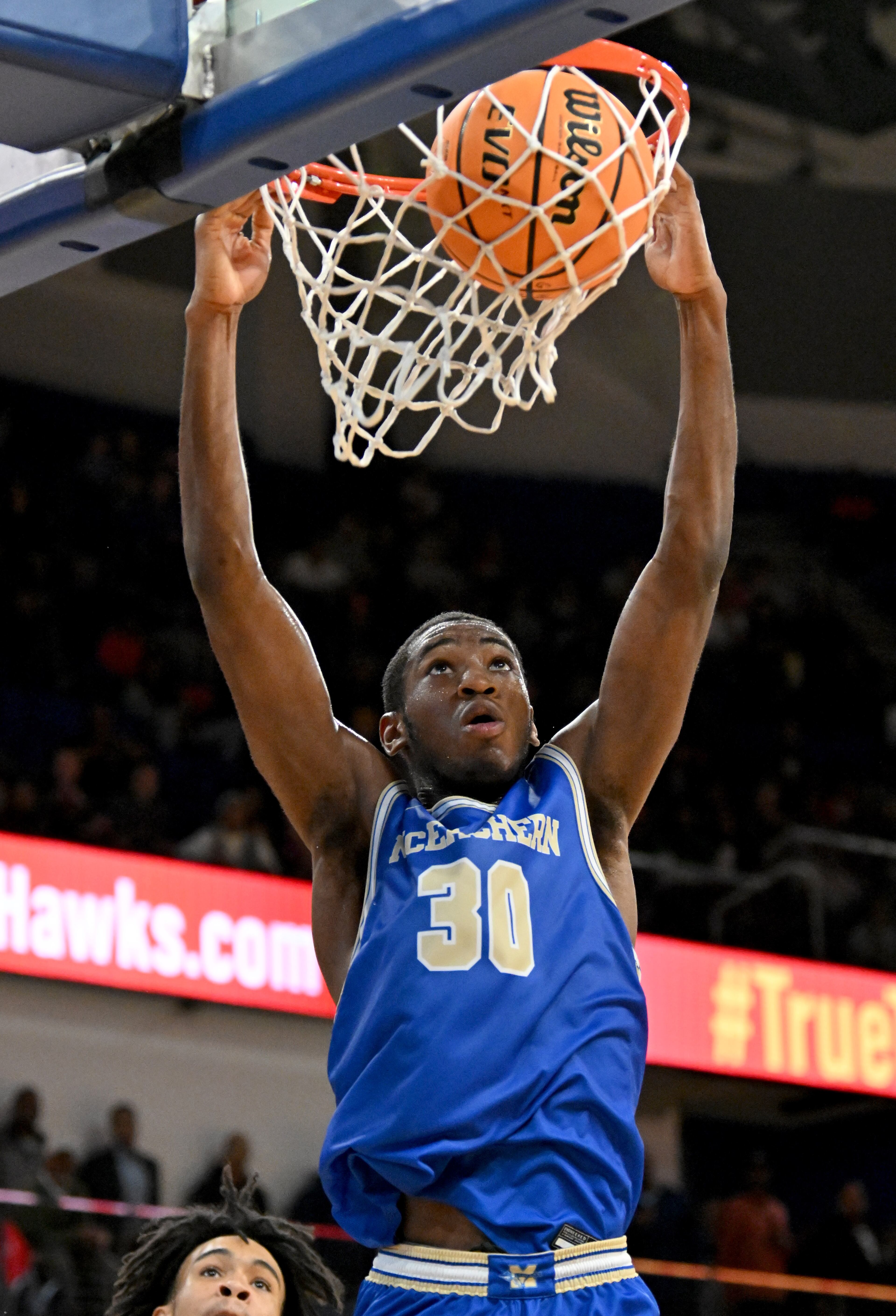 McEachern's Nnadozie Onyirimba (30) dunks the ball during the second half of GHSA Class 7A Semifinal basketball game at GSU’s Convocation Center, Saturday, Mar. 2, 2024, in Atlanta. (Hyosub Shin / Hyosub.Shin@ajc.com)