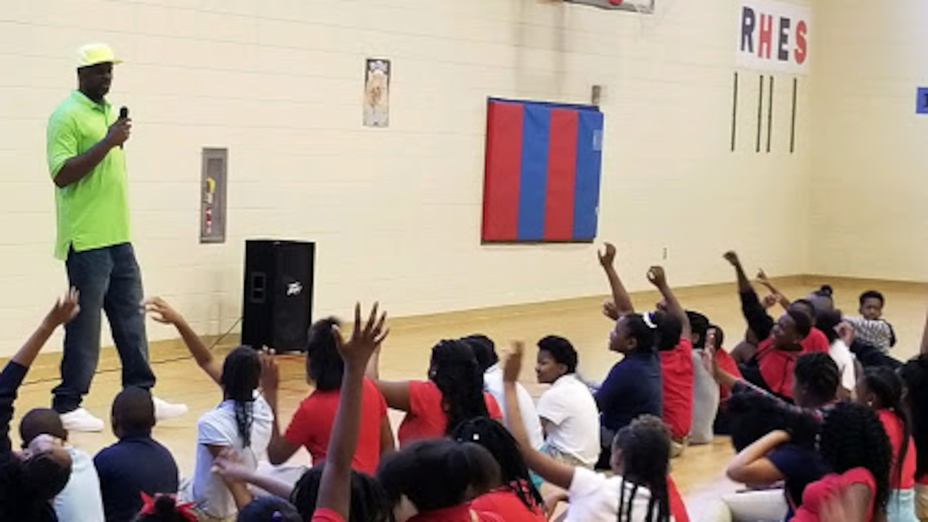 Dontonio Wingfield, a McDonald’s All-American basketball player in 1993 from Albany’s Westover High, speaks to kids at Henderson Gym, where he grew up playing. Wingfield’s NBA career ended in 1998 when he suffered debilitating injuries in a car crash. For the past 11 years, he has run the Albany Hawks/Pivot mentoring and basketball program in his hometown.