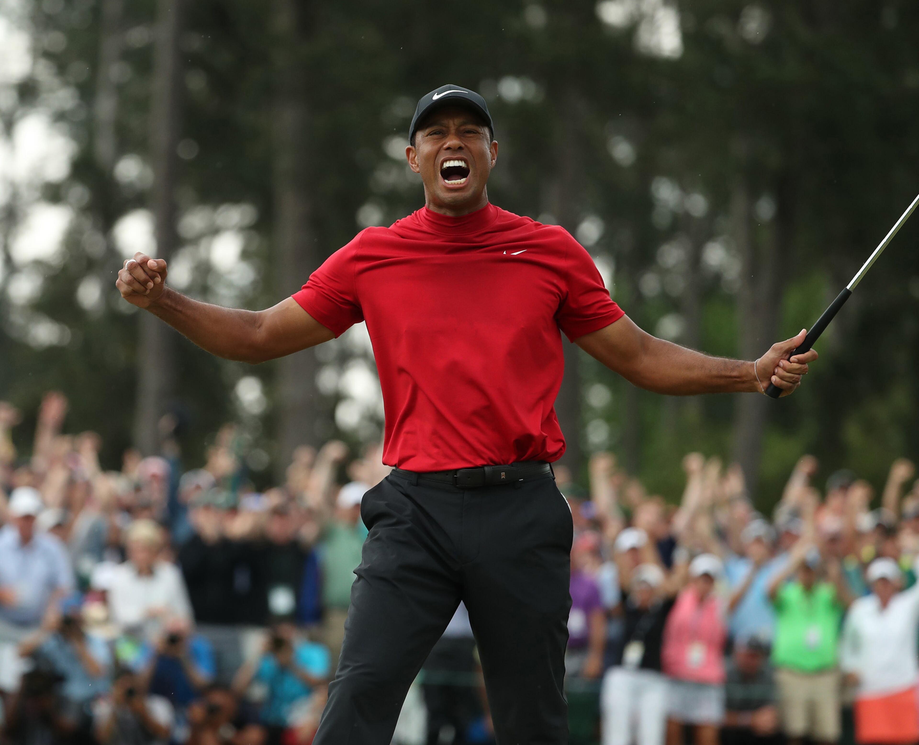 Tiger Woods celebrates after winning the Masters.