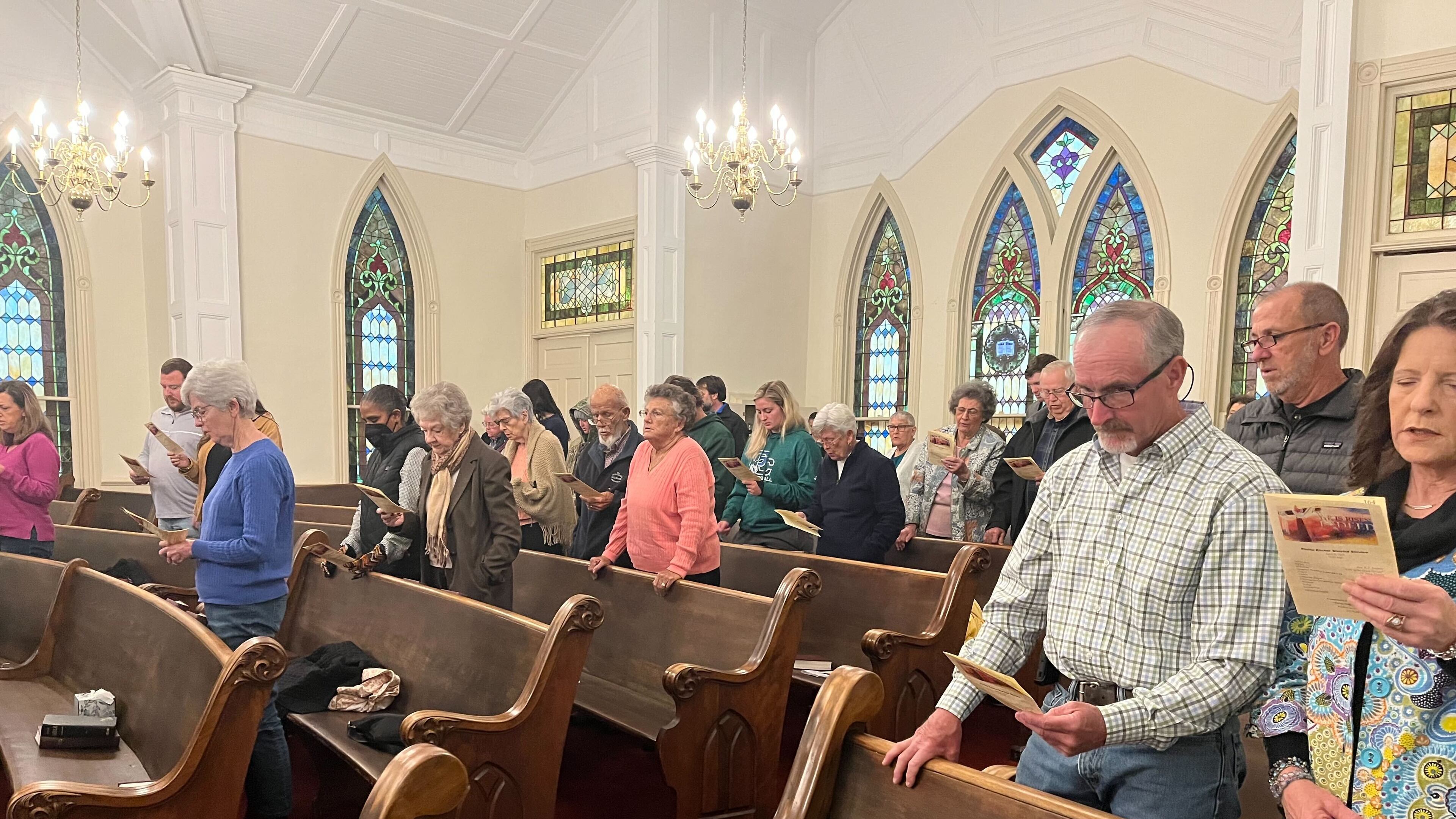 Worshippers from several denominations sing together during a sunrise service in Plains on Easter.